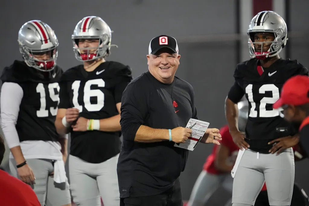 Ohio State Buckeyes offensive coordinator Chip Kelly works with quarterbacks during the first spring practice at the Woody Hayes Athletic Center
