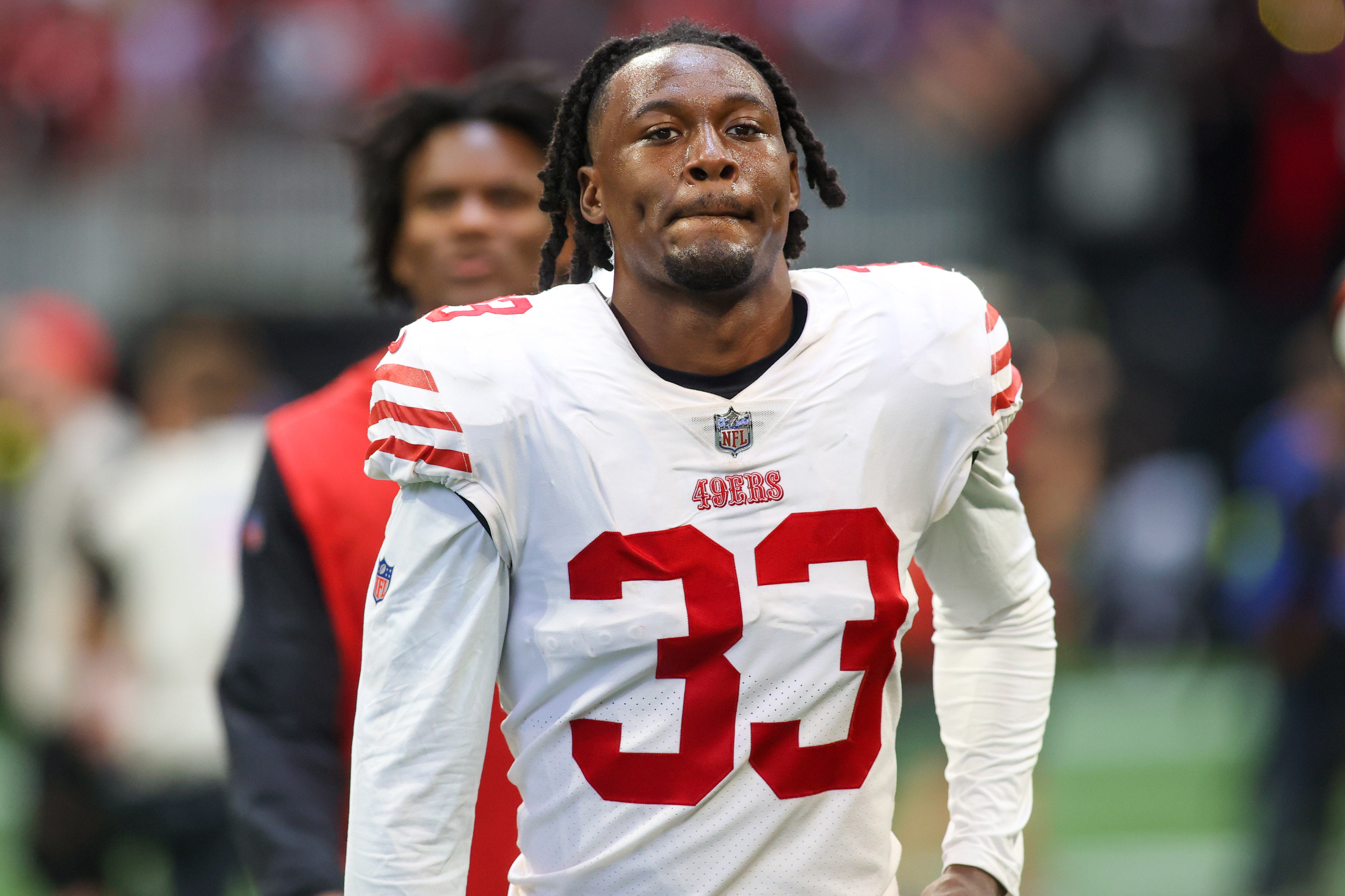 Oct 16, 2022; Atlanta, Georgia, USA; San Francisco 49ers safety Tarvarius Moore (33) runs off the field after a game against the Atlanta Falcons at Mercedes-Benz Stadium. Mandatory Credit: Brett Davis-USA TODAY Sports
