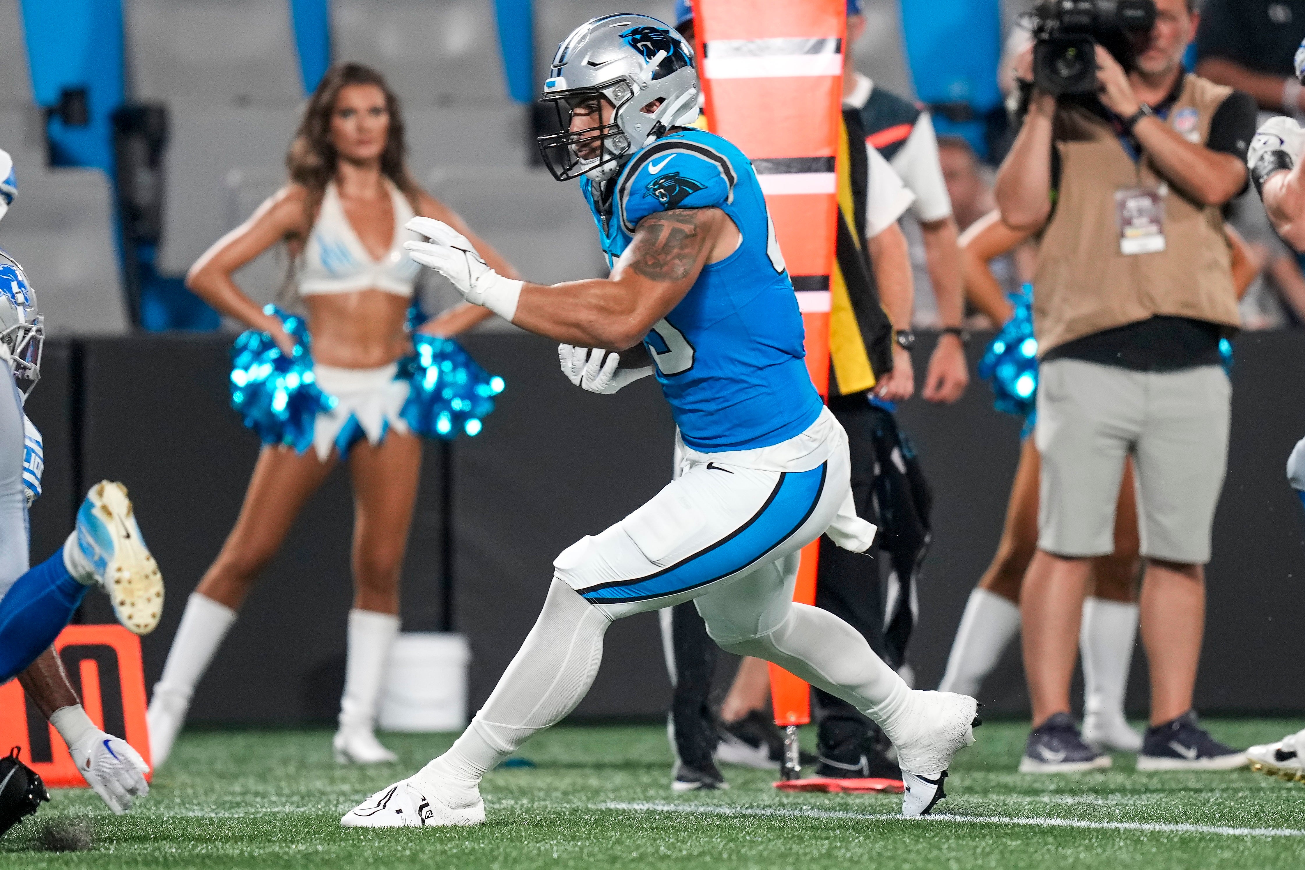 Aug 25, 2023; Charlotte, North Carolina, USA; Carolina Panthers tight end Giovanni Ricci (45) runs for yards after catch during the second half against the Detroit Lions at Bank of America Stadium.