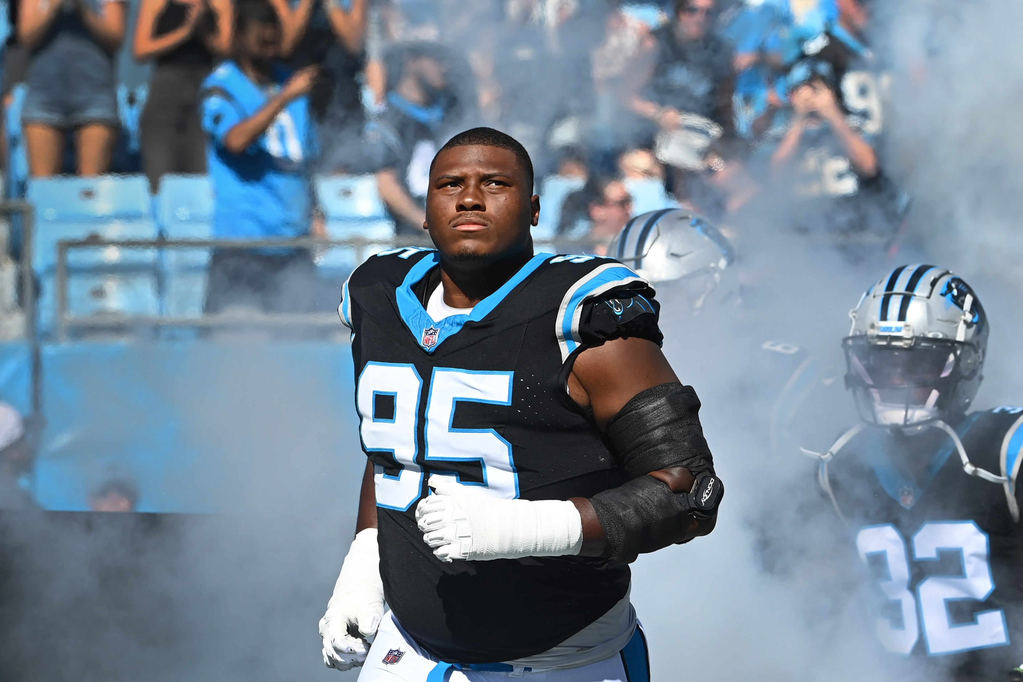 Oct 29, 2023; Charlotte, North Carolina, USA; Carolina Panthers defensive tackle Derrick Brown (95) runs on to the field at Bank of America Stadium. Mandatory Credit: Bob Donnan-USA TODAY Sports