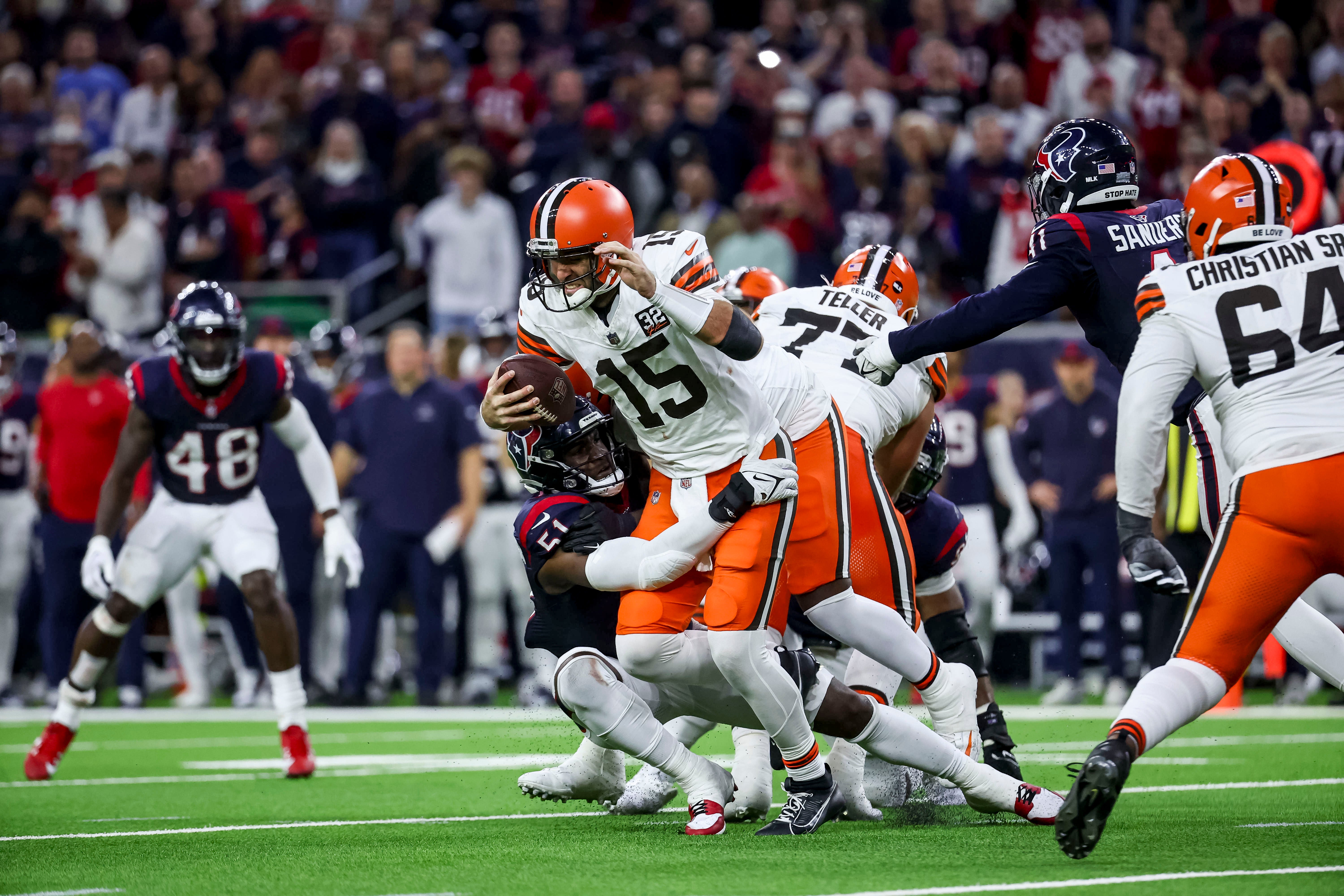 Jan 13, 2024; Houston, Texas, USA; /h051/ tackles Cleveland Browns quarterback Joe Flacco (15) during the fourth quarter in a 2024 AFC wild card game at NRG Stadium. Mandatory Credit: Troy Taormina-USA TODAY Sports