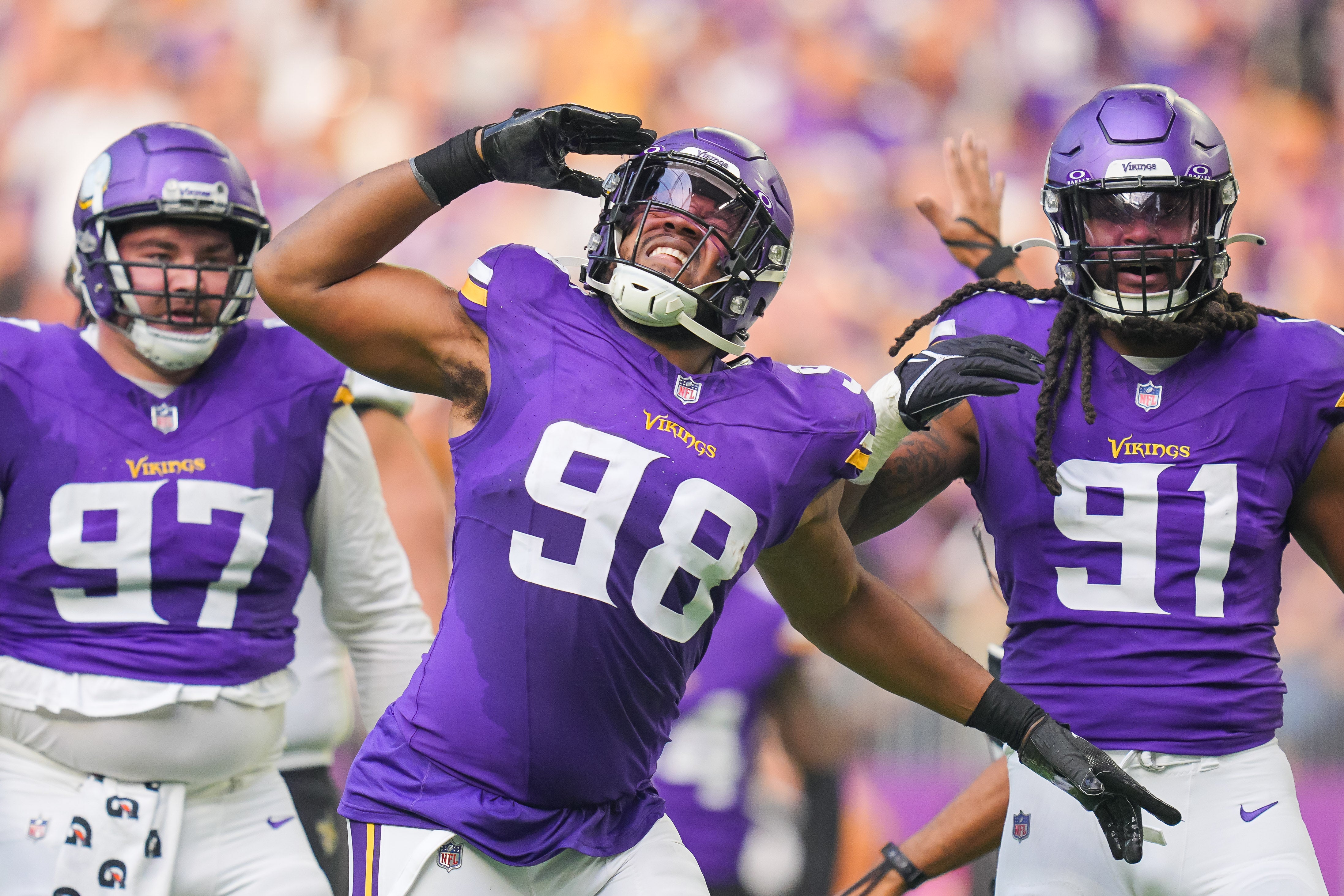 Nov 12, 2023; Minneapolis, Minnesota, USA; Minnesota Vikings linebacker D.J. Wonnum (98) celebrates his sack against the New Orleans Saints quarterback Derek Carr (4) in the second quarter at U.S. Bank Stadium.