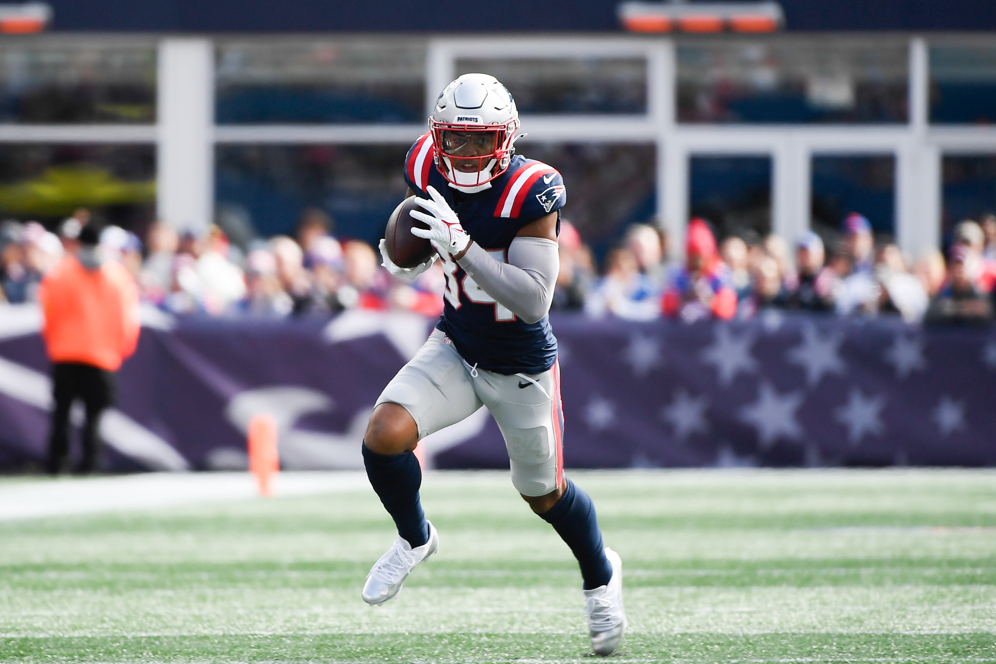 Oct 22, 2023; Foxborough, Massachusetts, USA; New England Patriots wide receiver Kendrick Bourne (84) runs with the ball during the first half against the Buffalo Bills at Gillette Stadium.