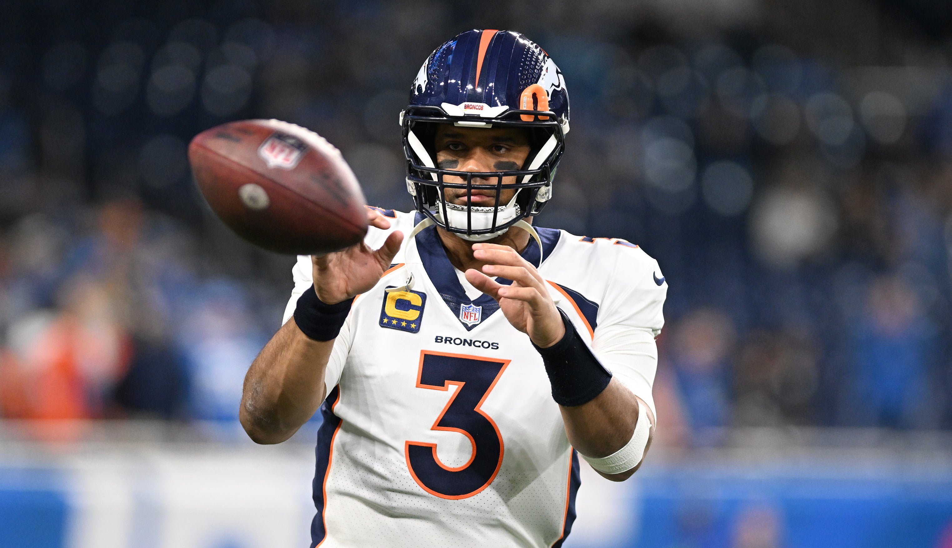Dec 16, 2023; Detroit, Michigan, USA; Denver Broncos quarterback Russell Wilson (3) warms up before a game against the Detroit Lions at Ford Field. Mandatory Credit: Lon Horwedel-USA TODAY Sports