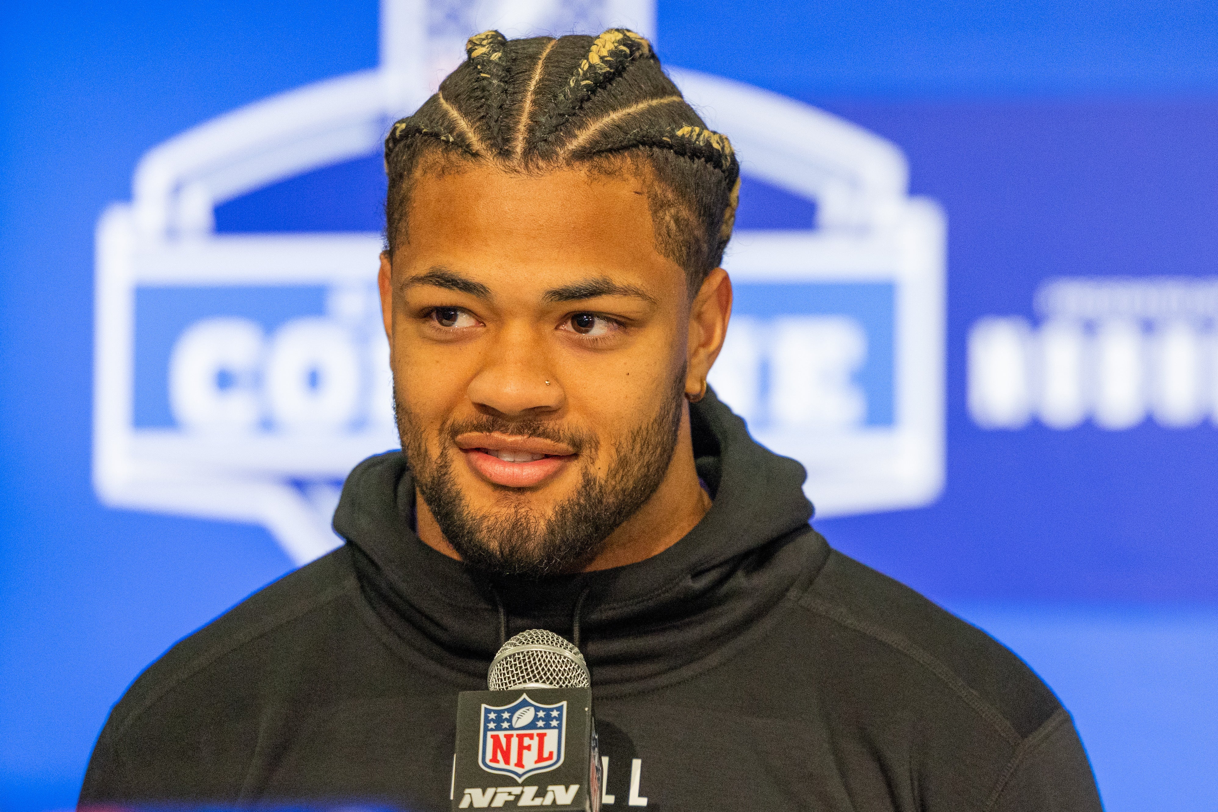 Mar 1, 2024; Indianapolis, IN, USA; Washington wide receiver Rome Odunze (WO22) talks to the media during the 2024 NFL Combine at Lucas Oil Stadium.
