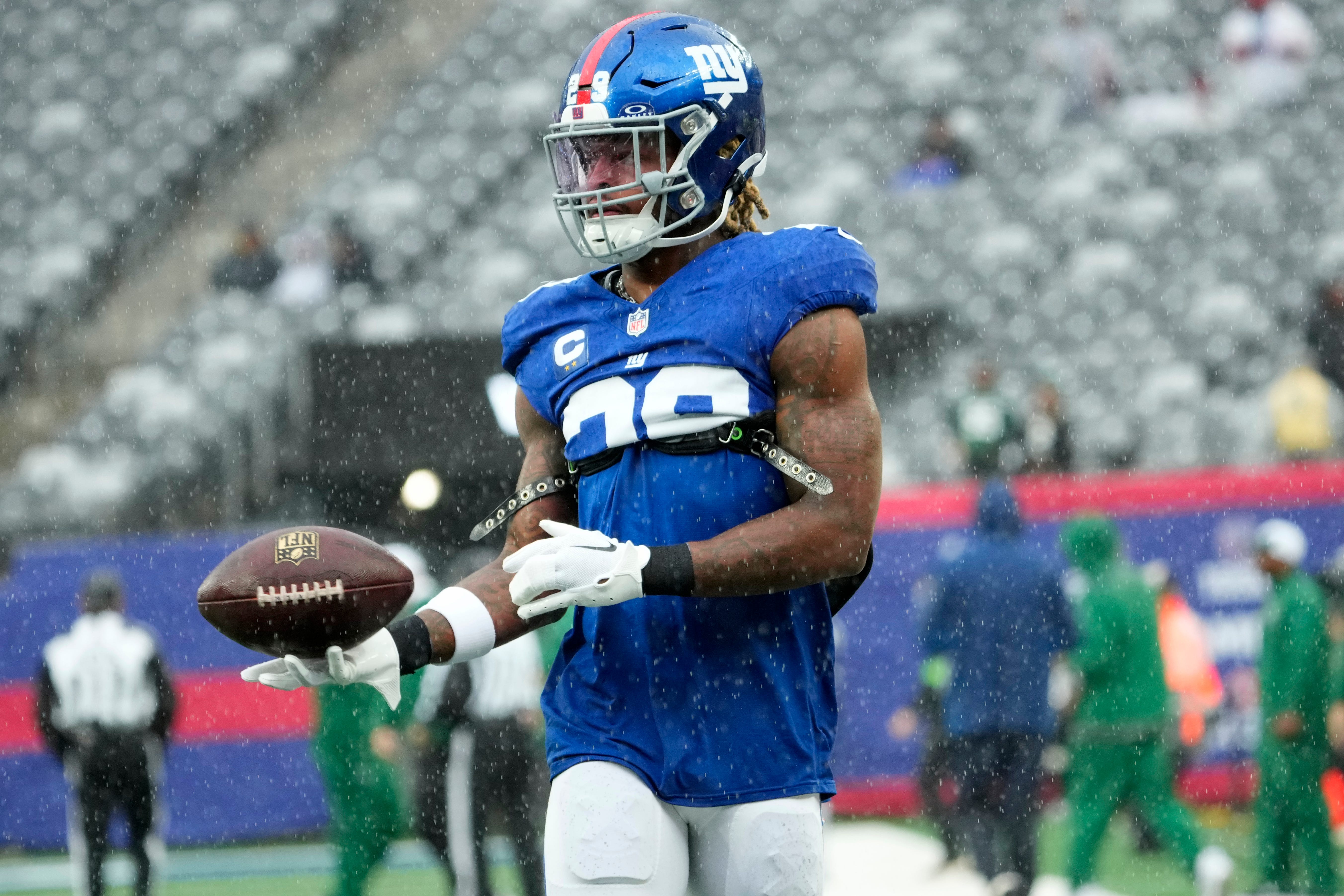 October 29, 2023; East Rutherford, NJ, USA; New York Giants safety Xavier McKinney (29) is shown with the ball during a pregame warm-up.