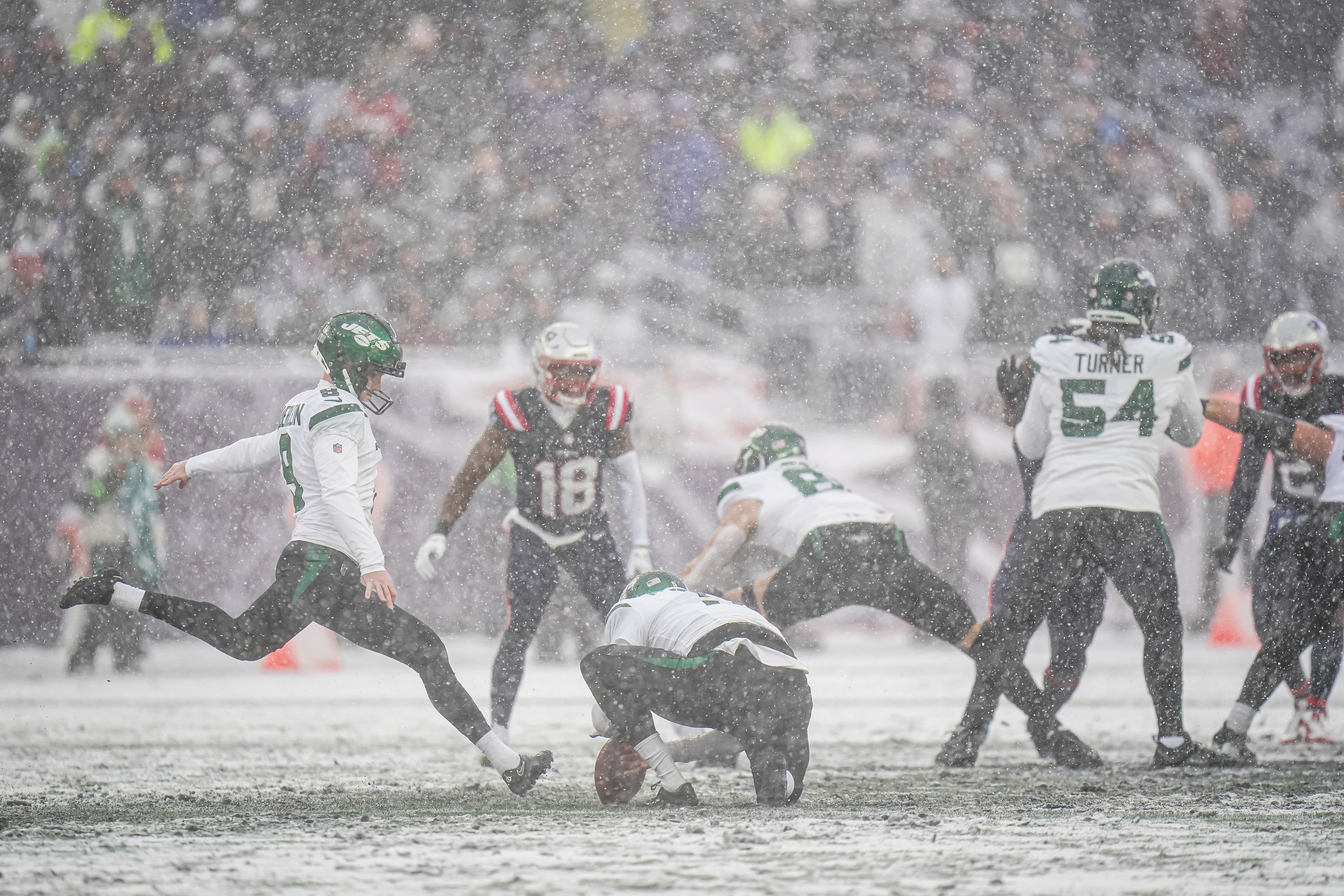 New York Jets place kicker Greg Zuerlein (9) kicks for a field goal against the New England Patriots in the first half at Gillette Stadium.