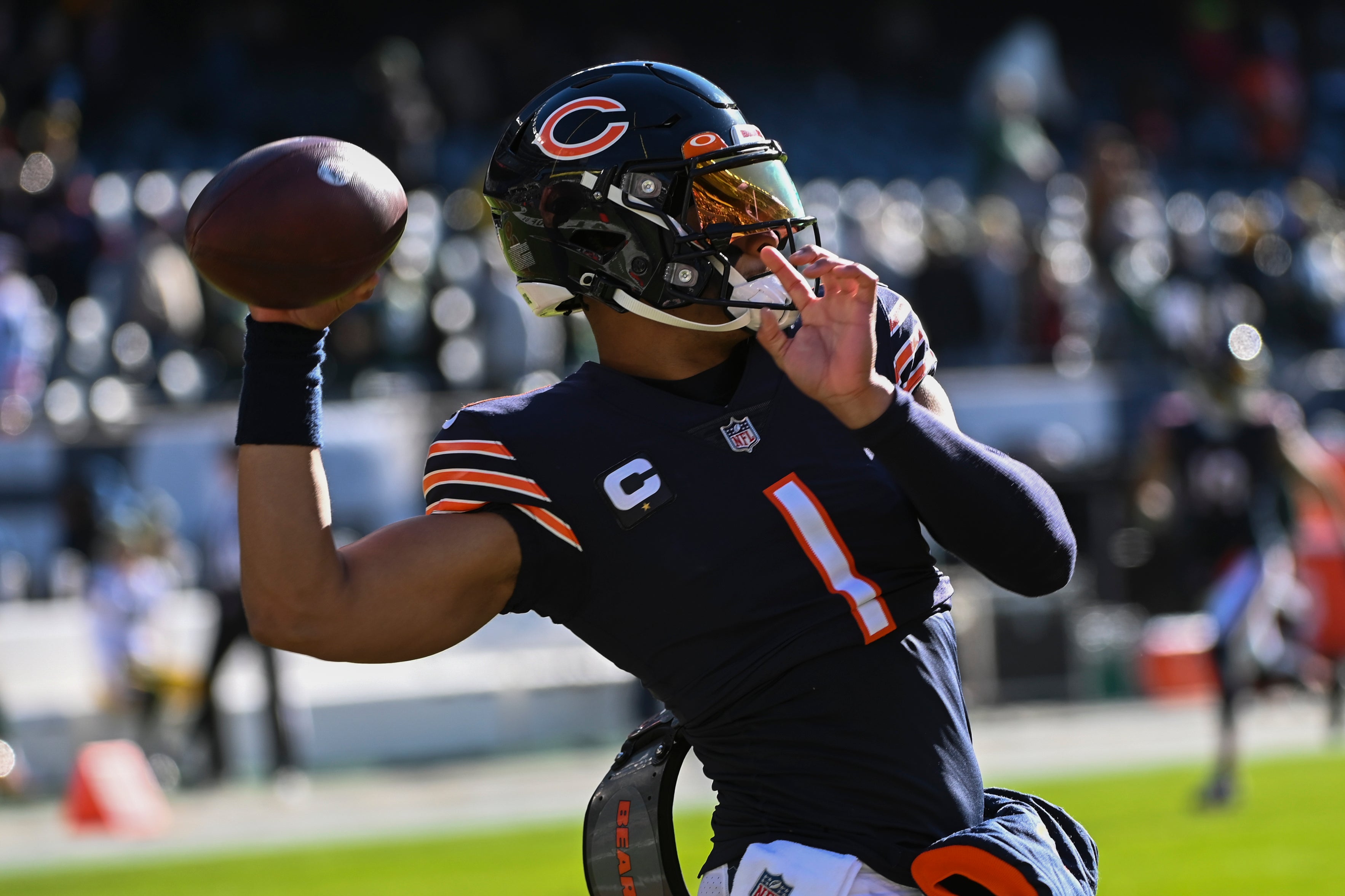 Dec 4, 2022; Chicago, Illinois, USA; Chicago Bears quarterback Justin Fields (1) warms up before a game against the Green Bay Packers at Soldier Field.