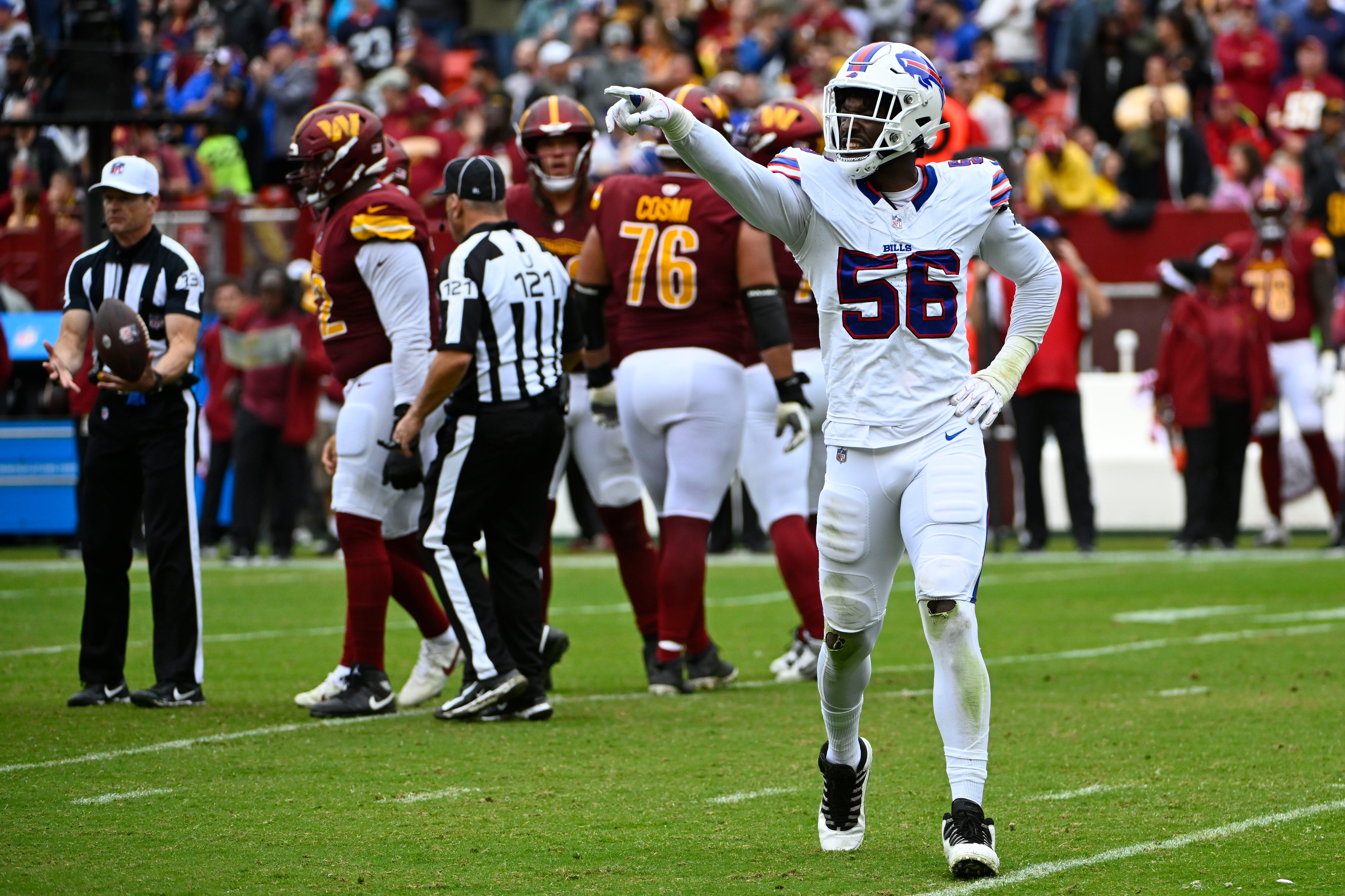 Sep 24, 2023; Landover, Maryland, USA; Buffalo Bills defensive end Leonard Floyd (56) reacts after recording a sack against the Washington Commanders during the second half at FedEx Field.