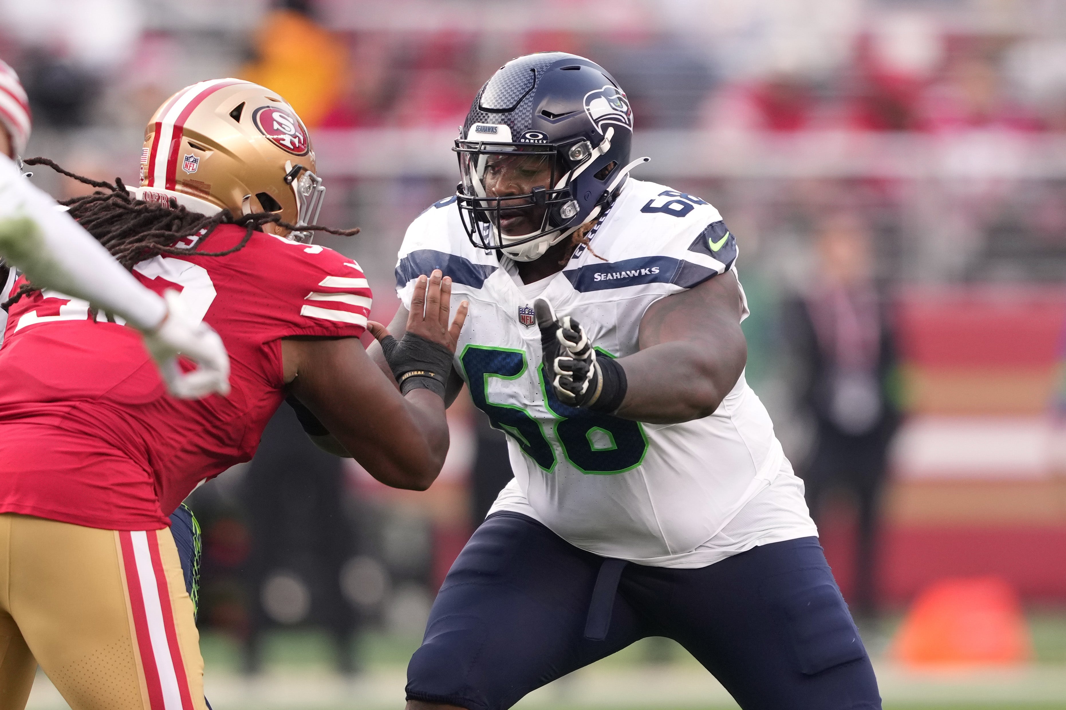 Dec 10, 2023; Santa Clara, California, USA; Seattle Seahawks guard Damien Lewis (68) blocks San Francisco 49ers defensive tackle Kalia Davis (93) during the third quarter at Levi's Stadium.