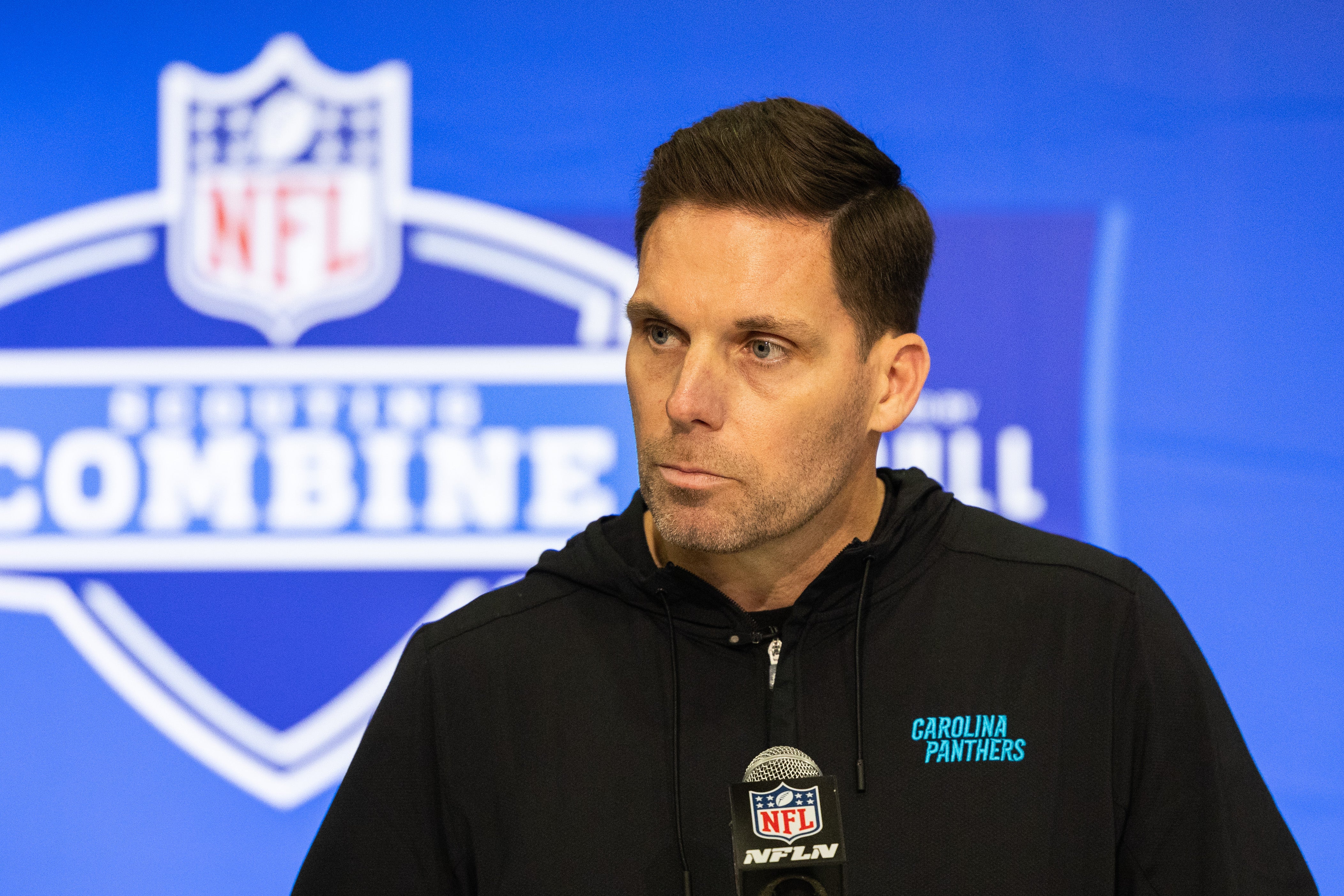 Feb 27, 2024; Indianapolis, IN, USA; Carolina Panthers President of Football Operations/General Manager Dan Morgan talks to the media at the 2024 NFL Combine at Indiana Convention Center. Mandatory Credit: Trevor Ruszkowski-USA TODAY Sports