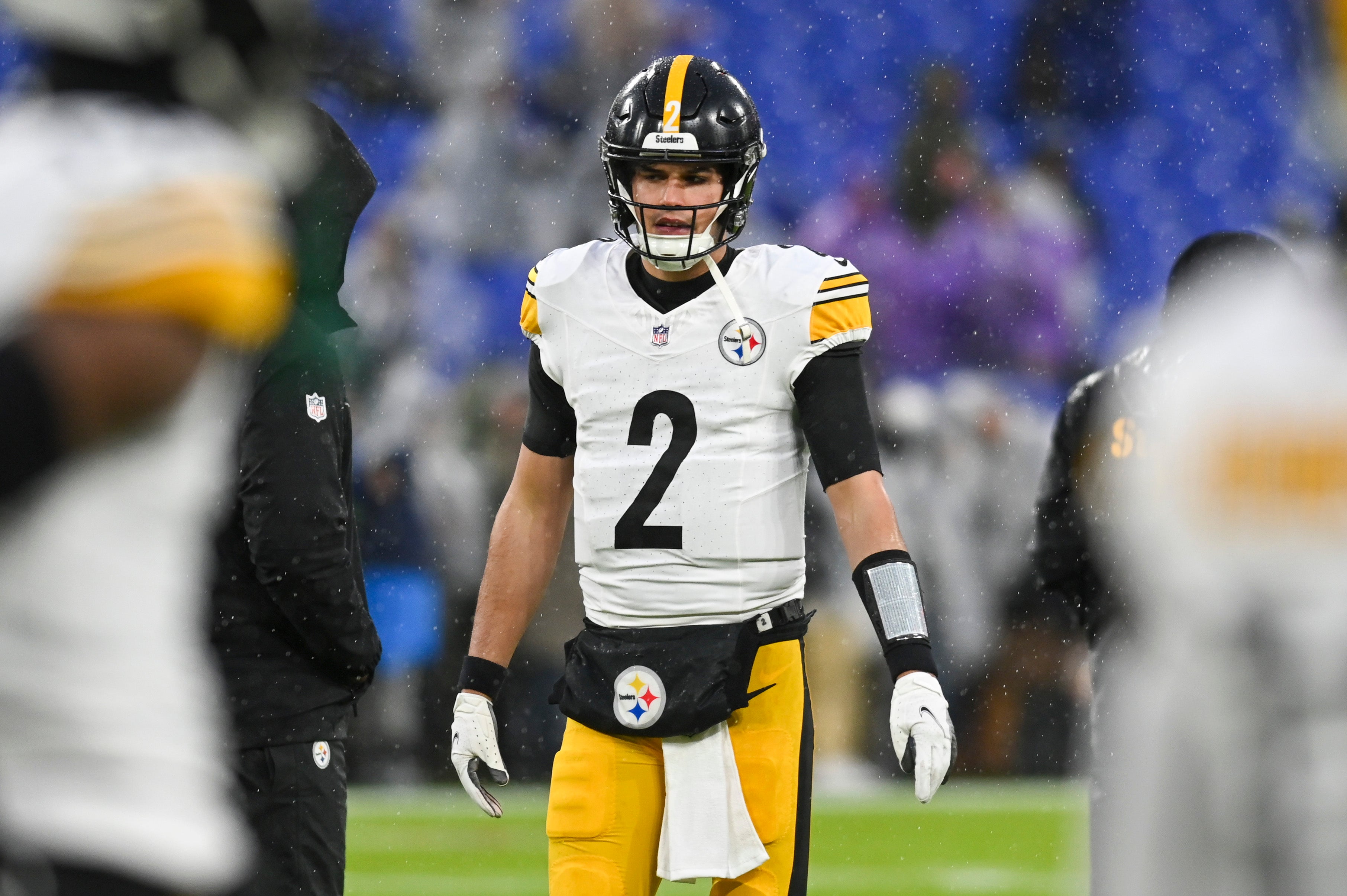 Jan 6, 2024; Baltimore, Maryland, USA; Pittsburgh Steelers quarterback Mason Rudolph (2) walks on the field as rain come down prior to the start of the game against the Baltimore Ravens at M&T Bank Stadium. Mandatory Credit: Tommy Gilligan-USA TODAY Sports