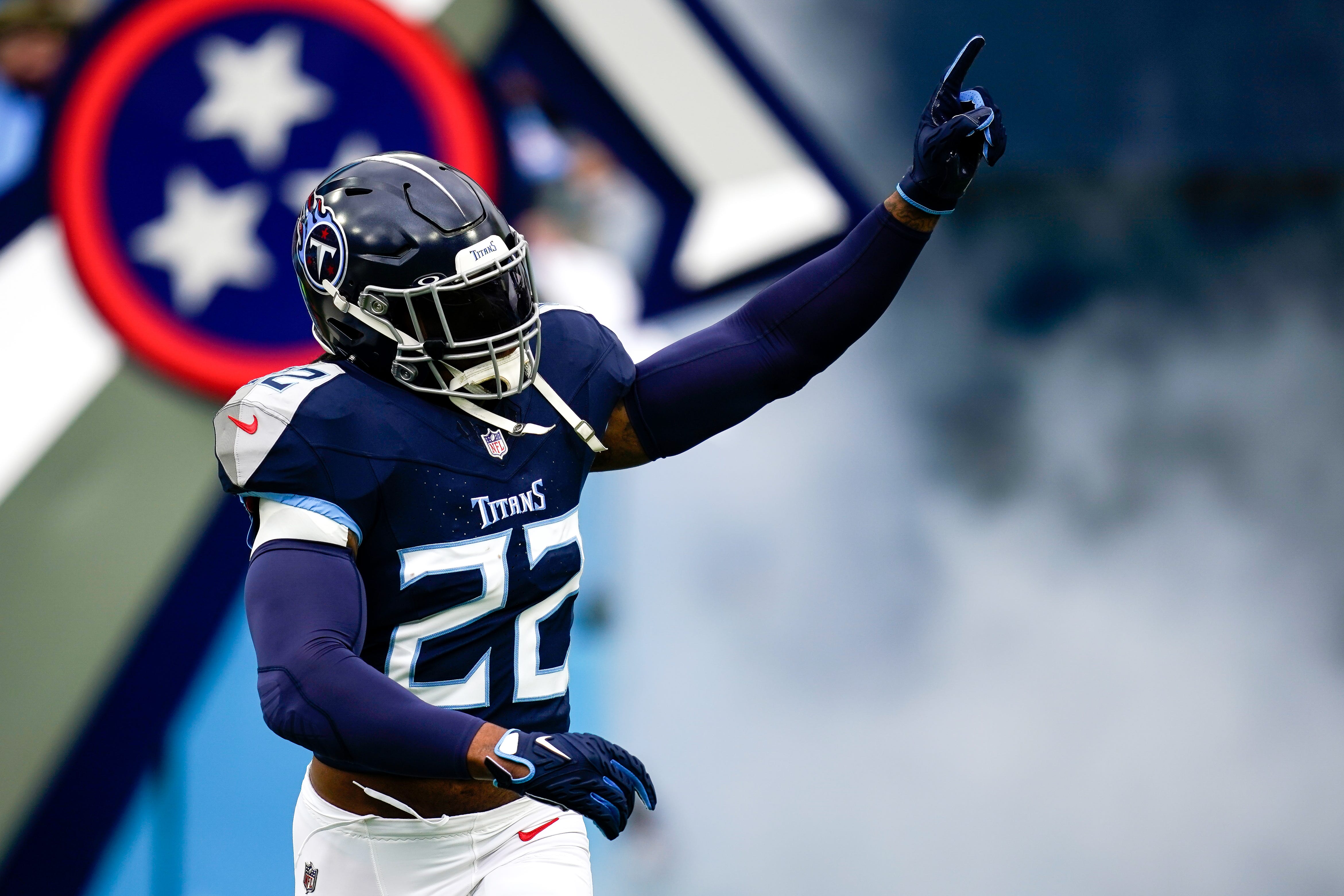 Tennessee Titans running back Derrick Henry (22) waves to fans as he is introduced before a game against the Jacksonville Jaguars at Nissan Stadium in Nashville, Tenn., Sunday, Jan. 7, 2024.
