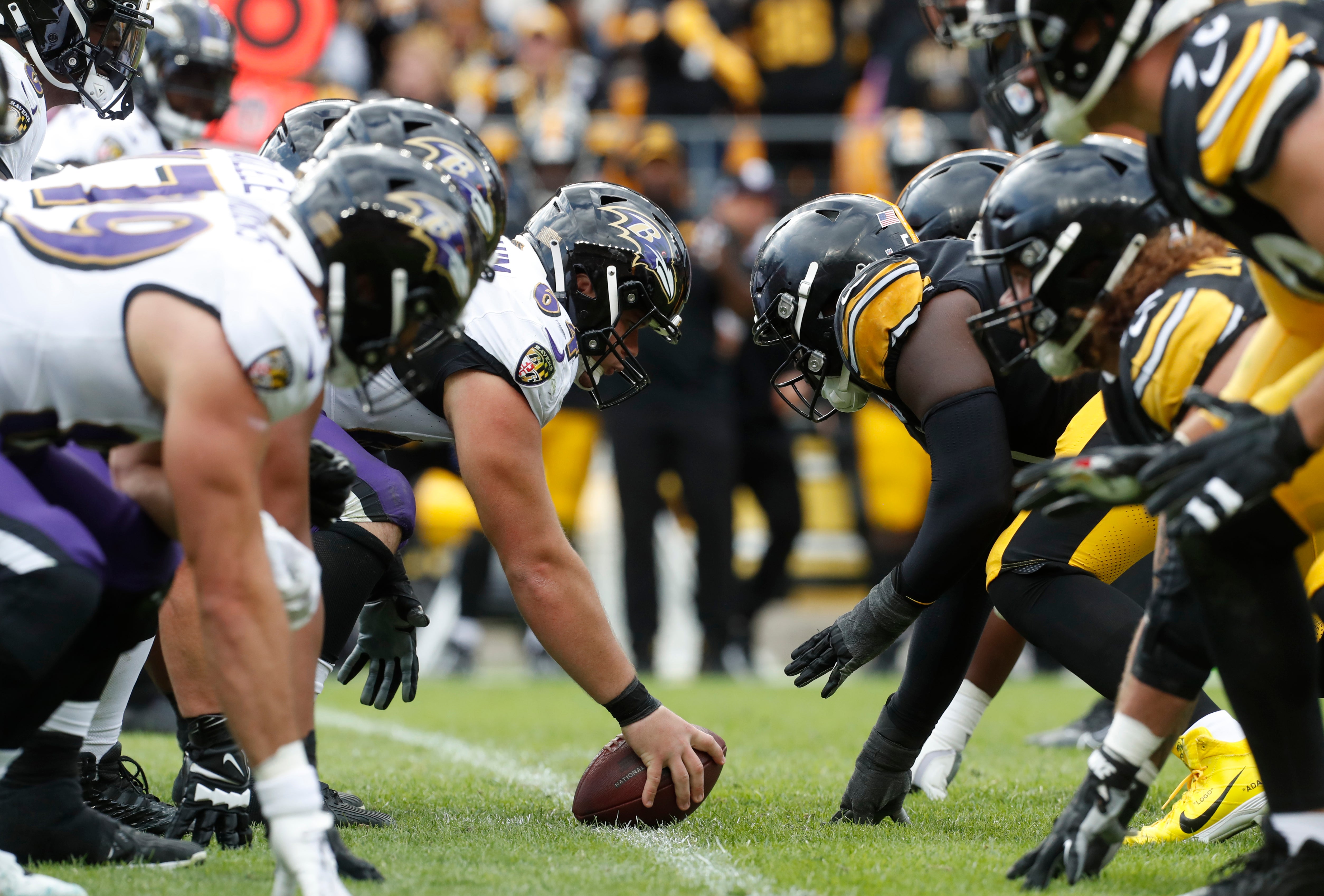 Oct 8, 2023; Pittsburgh, Pennsylvania, USA; Baltimore Ravens center Tyler Linderbaum (64) prepares to snap the ball gainst the Pittsburgh Steelers during the fourth quarter at Acrisure Stadium. Pittsburgh won 17-10. Mandatory Credit: Charles LeClaire-USA TODAY Sports