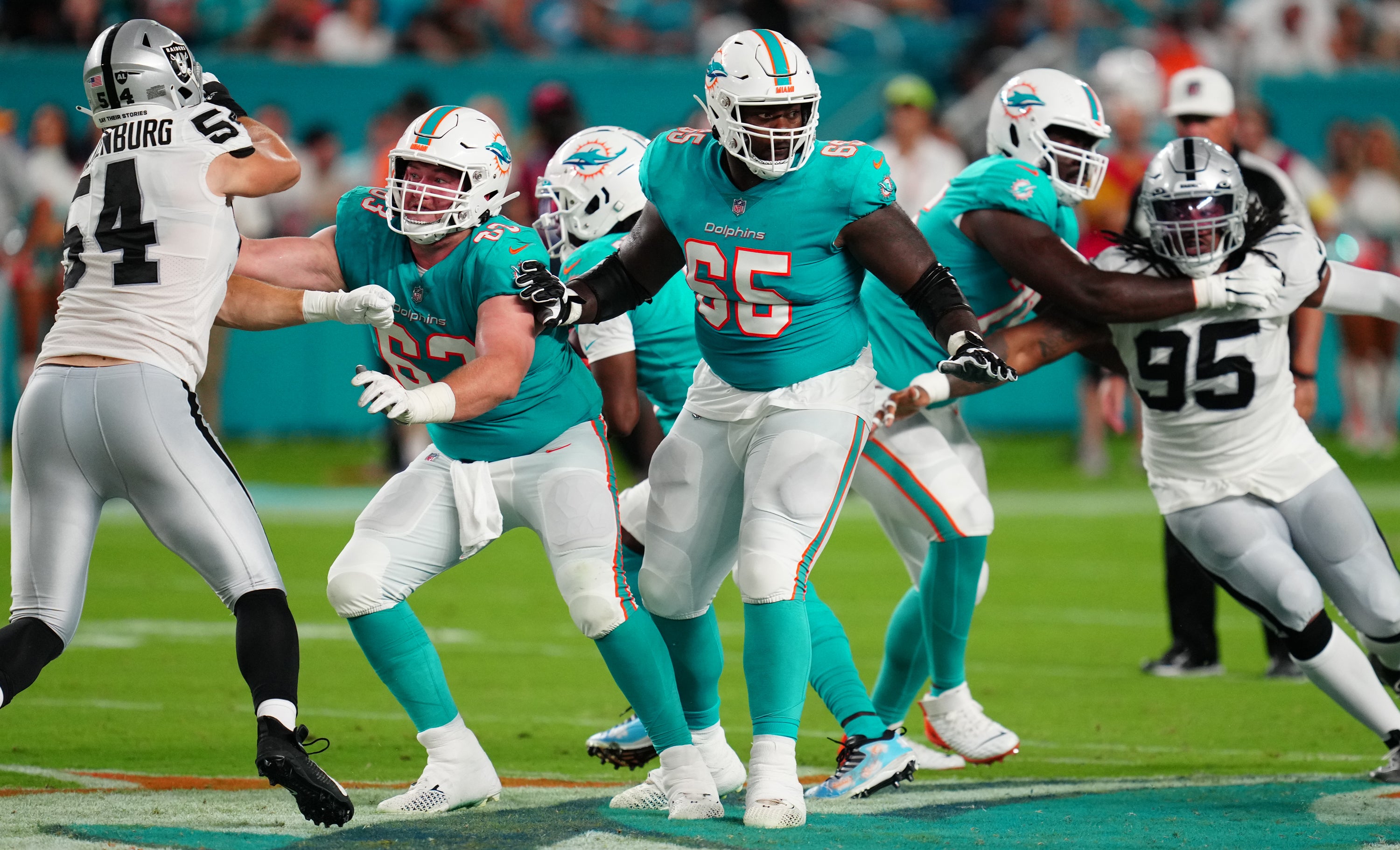 Aug 20, 2022; Miami Gardens, Florida, USA; Miami Dolphins guard Robert Jones (65) blocks against the Las Vegas Raiders in the second quarter at Hard Rock Stadium.