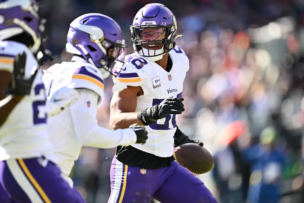 Minnesota Vikings linebacker Jordan Hicks (58) celebrates after making an interception in the first half against the Chicago Bears at Soldier Field.