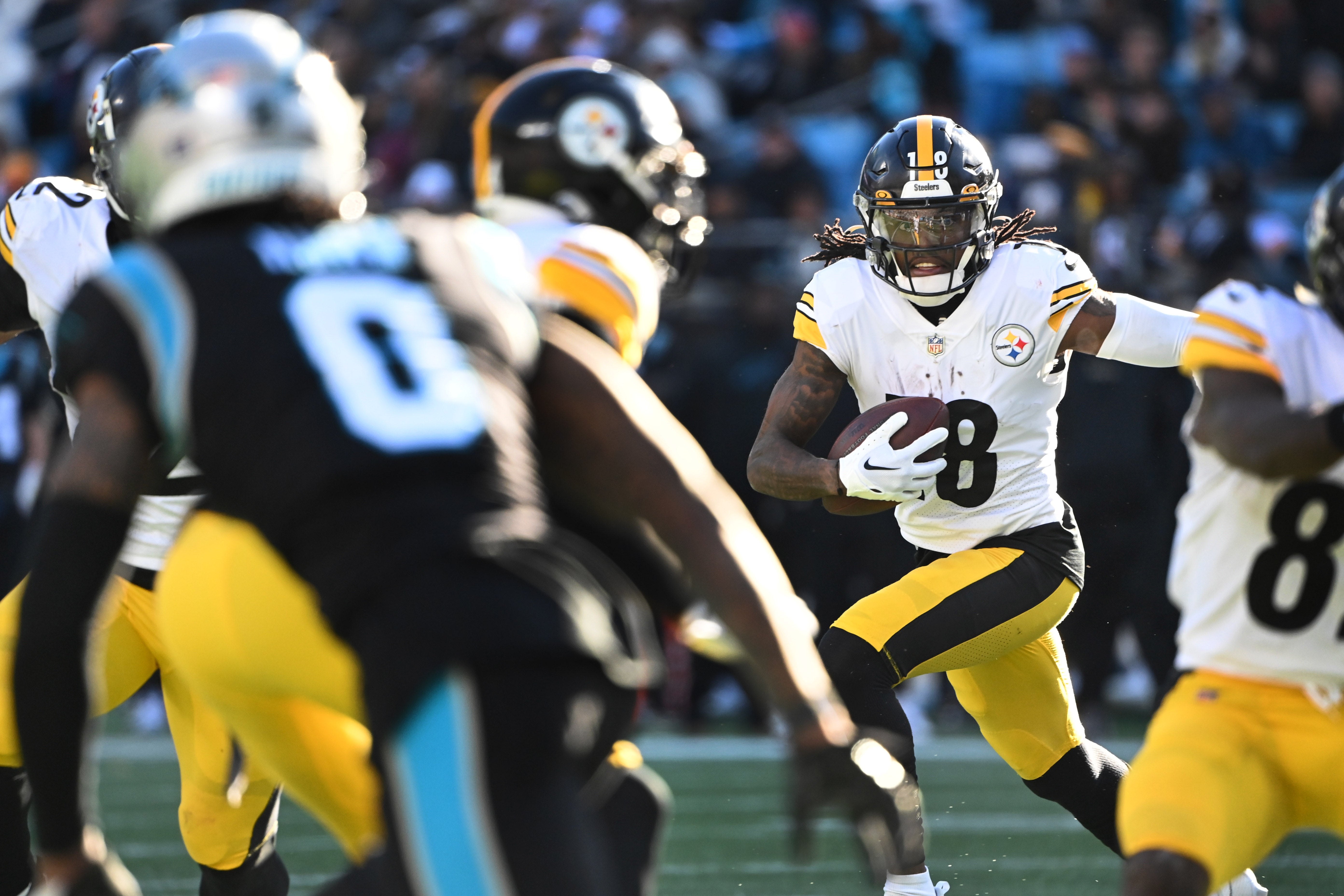 Dec 18, 2022; Charlotte, North Carolina, USA; Pittsburgh Steelers wide receiver Diontae Johnson (18) with the ball in the third quarter at Bank of America Stadium. Mandatory Credit: Bob Donnan-USA TODAY Sports