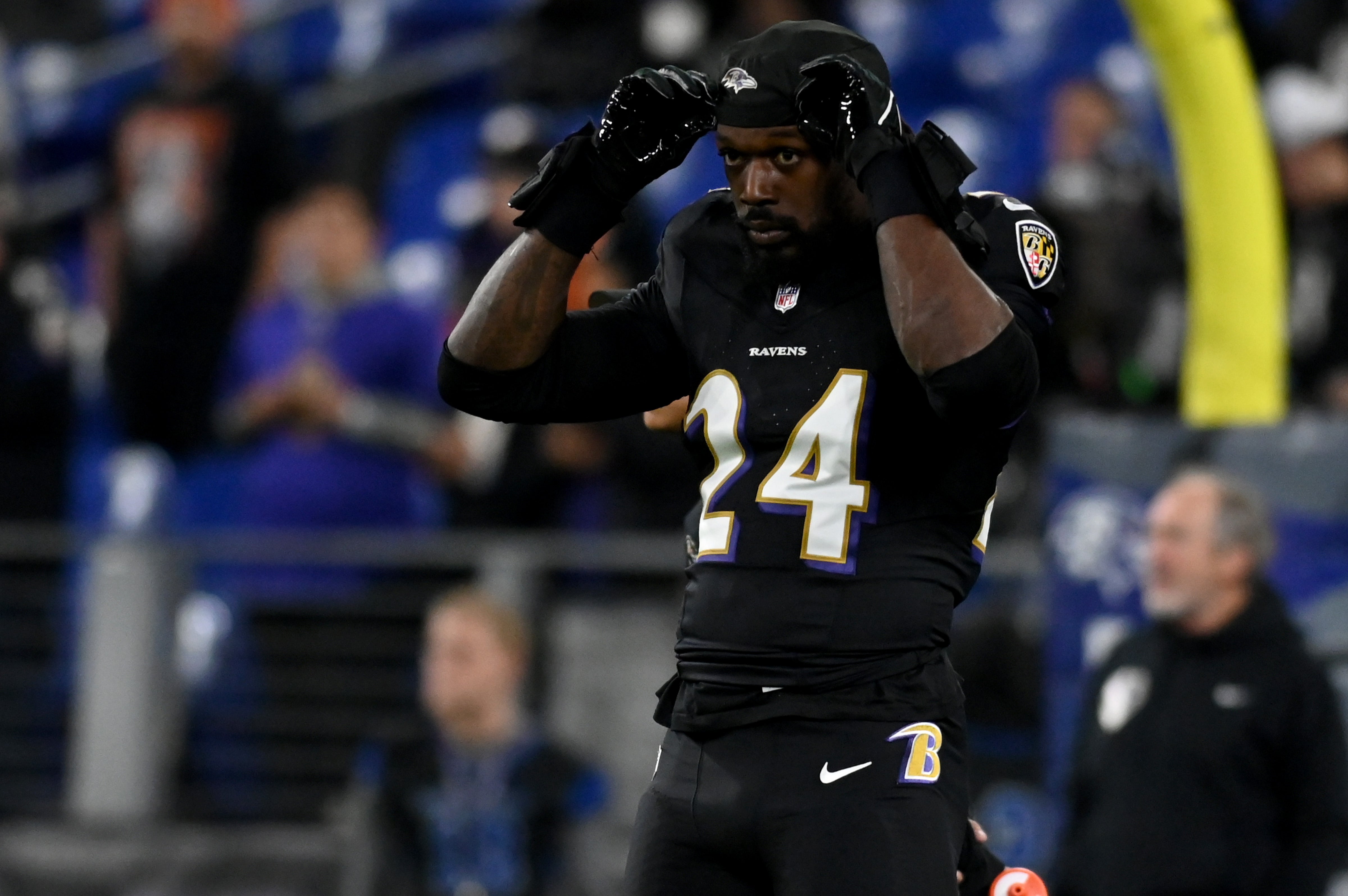 Nov 16, 2023; Baltimore, Maryland, USA; Baltimore Ravens linebacker Jadeveon Clowney (24) warms up before a game against the Cincinnati Bengals at M&T Bank Stadium. Mandatory Credit: Tommy Gilligan-USA TODAY Sports