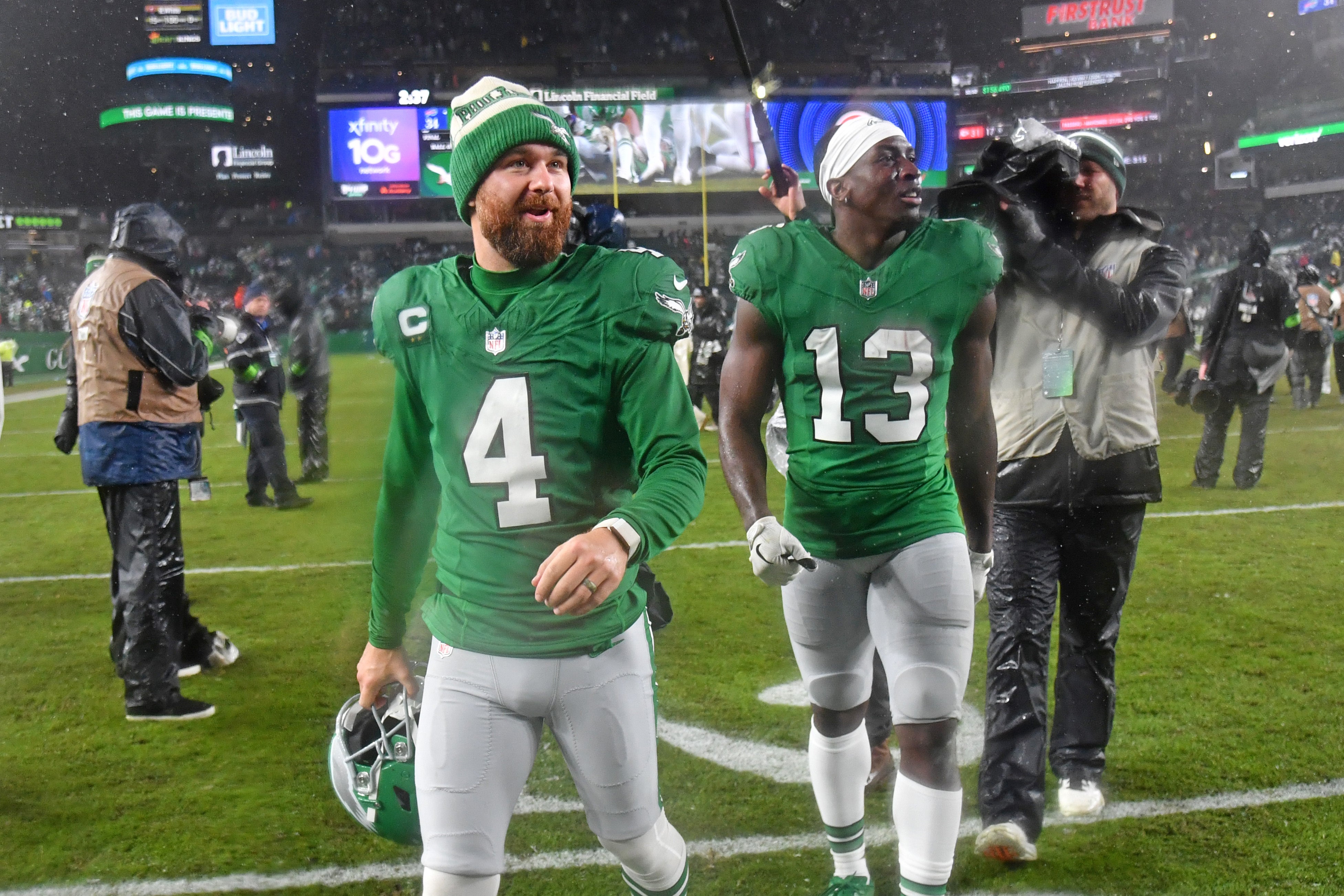 Nov 26, 2023; Philadelphia, Pennsylvania, USA;Philadelphia Eagles place kicker Jake Elliott (4) and wide receiver Olamide Zaccheaus (13) walk off the field after overtime win against the Buffalo Bills at Lincoln Financial Field.
