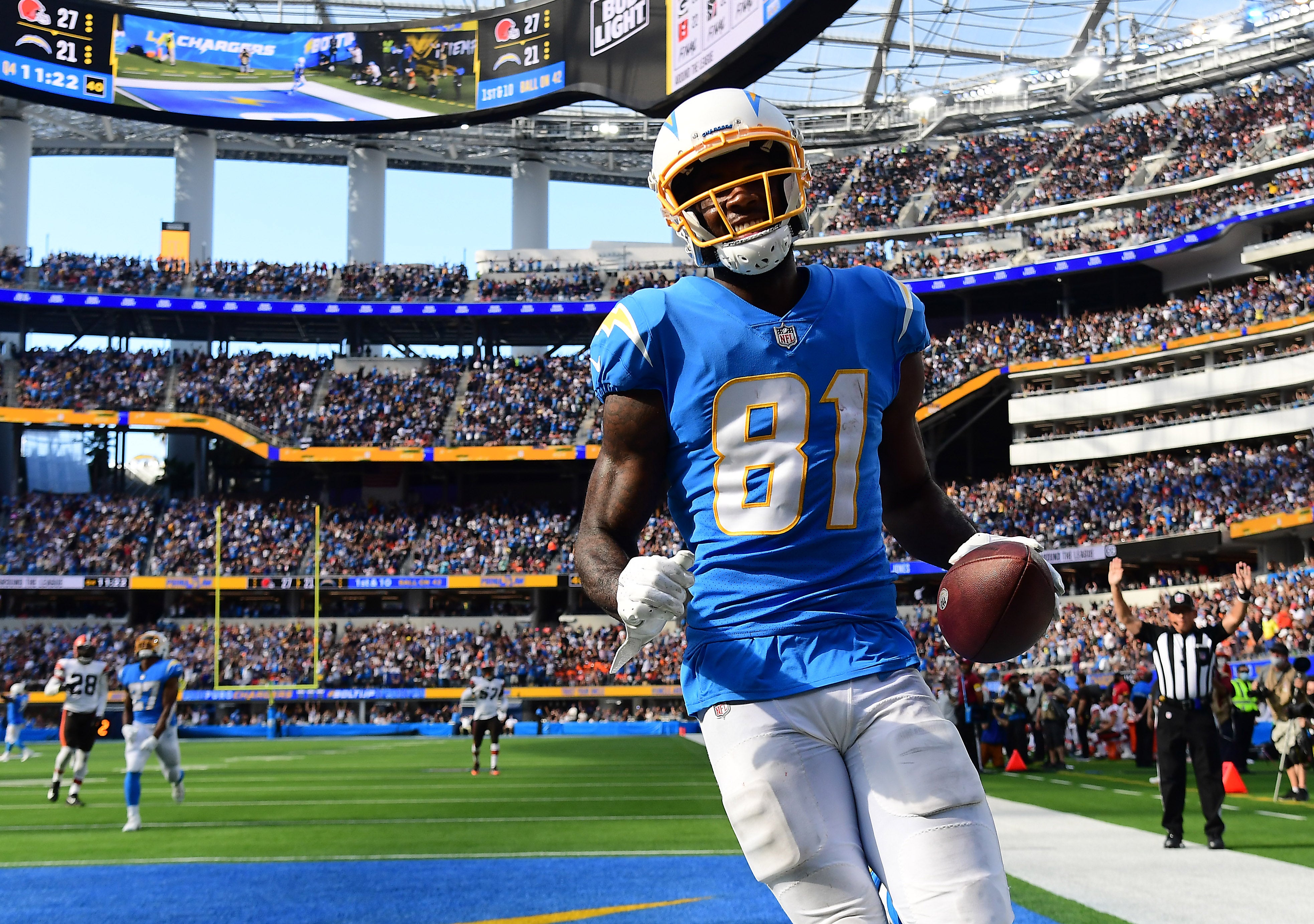 Oct 10, 2021; Inglewood, California, USA; Los Angeles Chargers wide receiver Mike Williams (81) scores a touchdown against the Cleveland Browns during the second half at SoFi Stadium.
