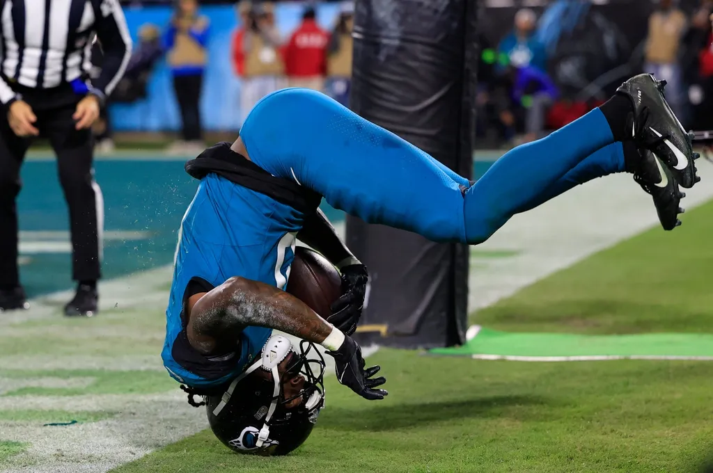Jacksonville Jaguars wide receiver Calvin Ridley (0) tumbles after catches a pass but ruled incomplete during the fourth quarter of a regular season NFL football matchup Sunday, Dec. 17, 2023 at EverB...