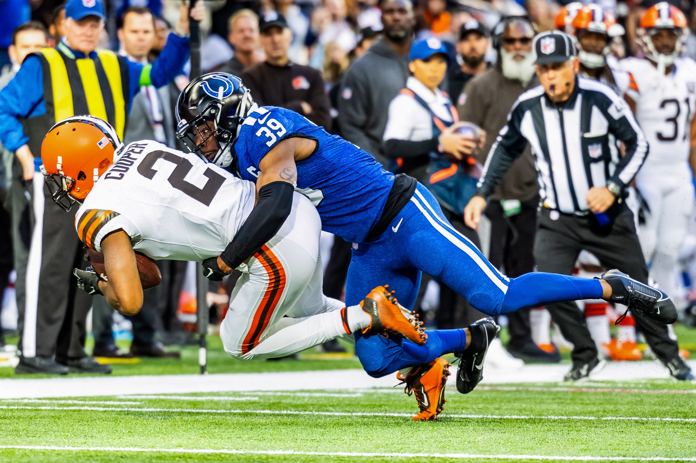 Oct 22, 2023; Indianapolis, Indiana, USA; Cleveland Browns wide receiver Amari Cooper (2) is tackled after a catch by Indianapolis Colts cornerback Darrell Baker Jr. (39) in the second half at Lucas Oil Stadium.