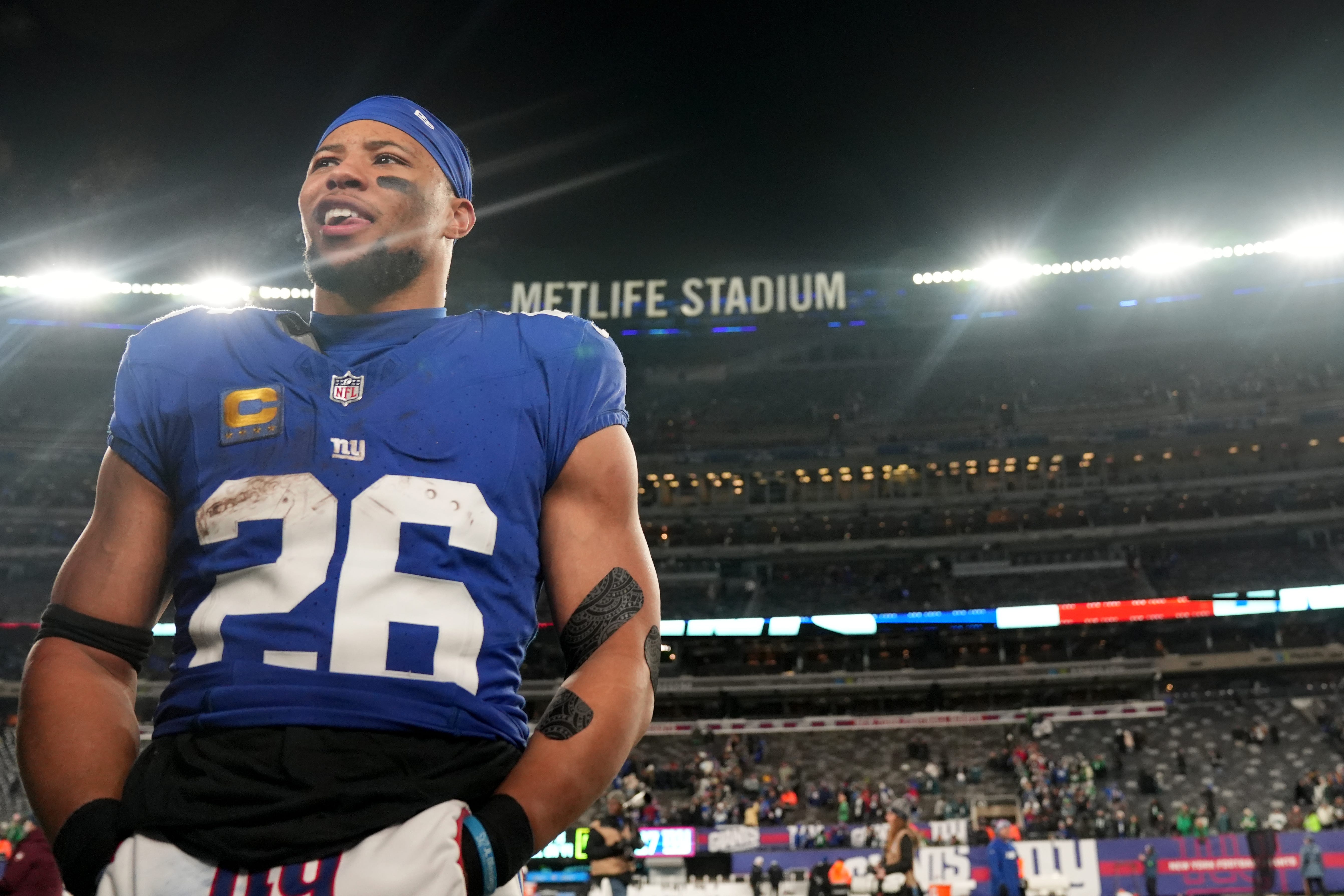 New York Giants running back Saquon Barkley (26) is shown on the field after the game, Sunday, January 7, 2024.