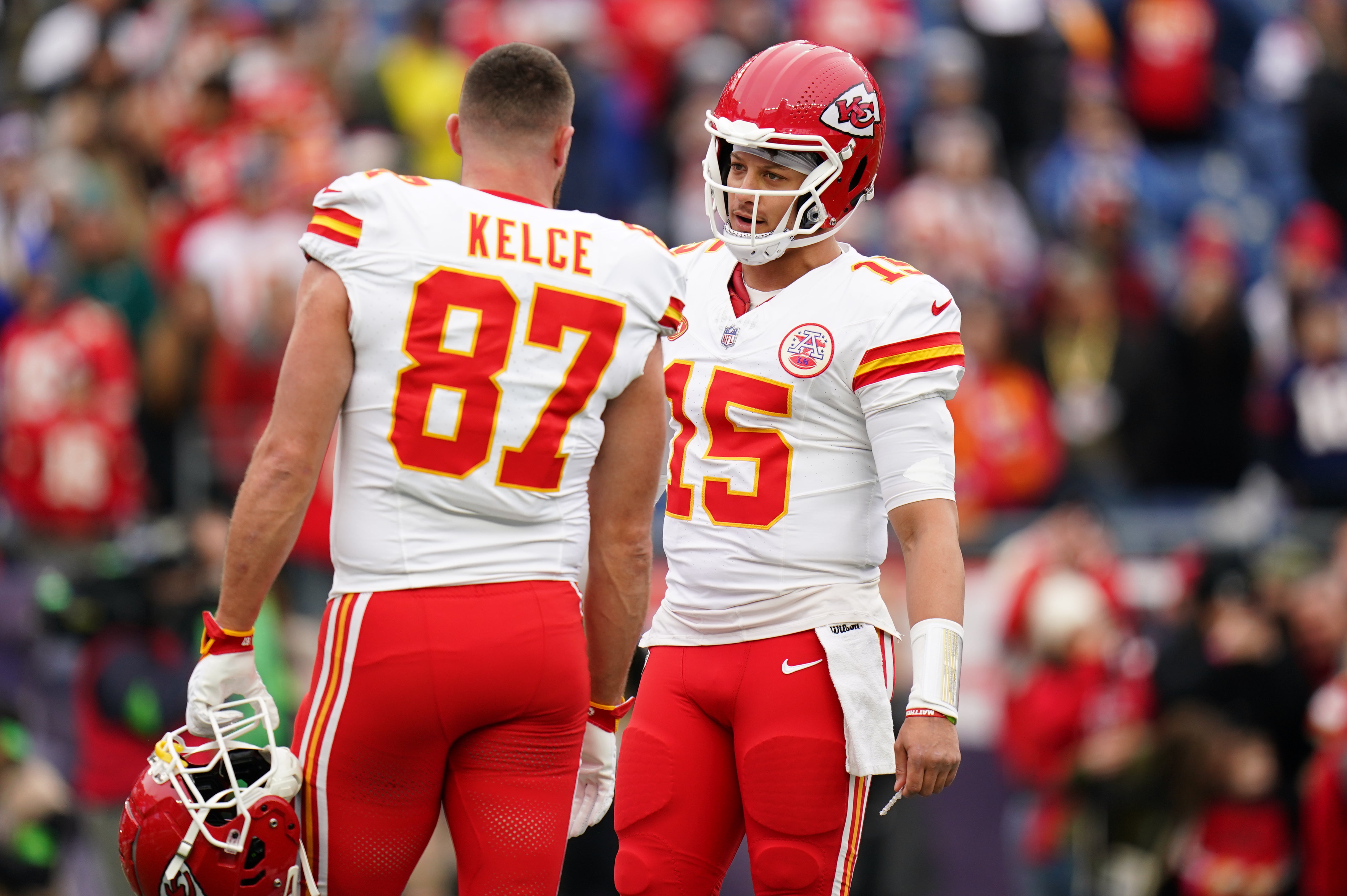 Dec 17, 2023; Foxborough, Massachusetts, USA; Kansas City Chiefs quarterback Patrick Mahomes (15) and tight end Travis Kelce (87) warm up before the game against the New England Patriots at Gillette Stadium.