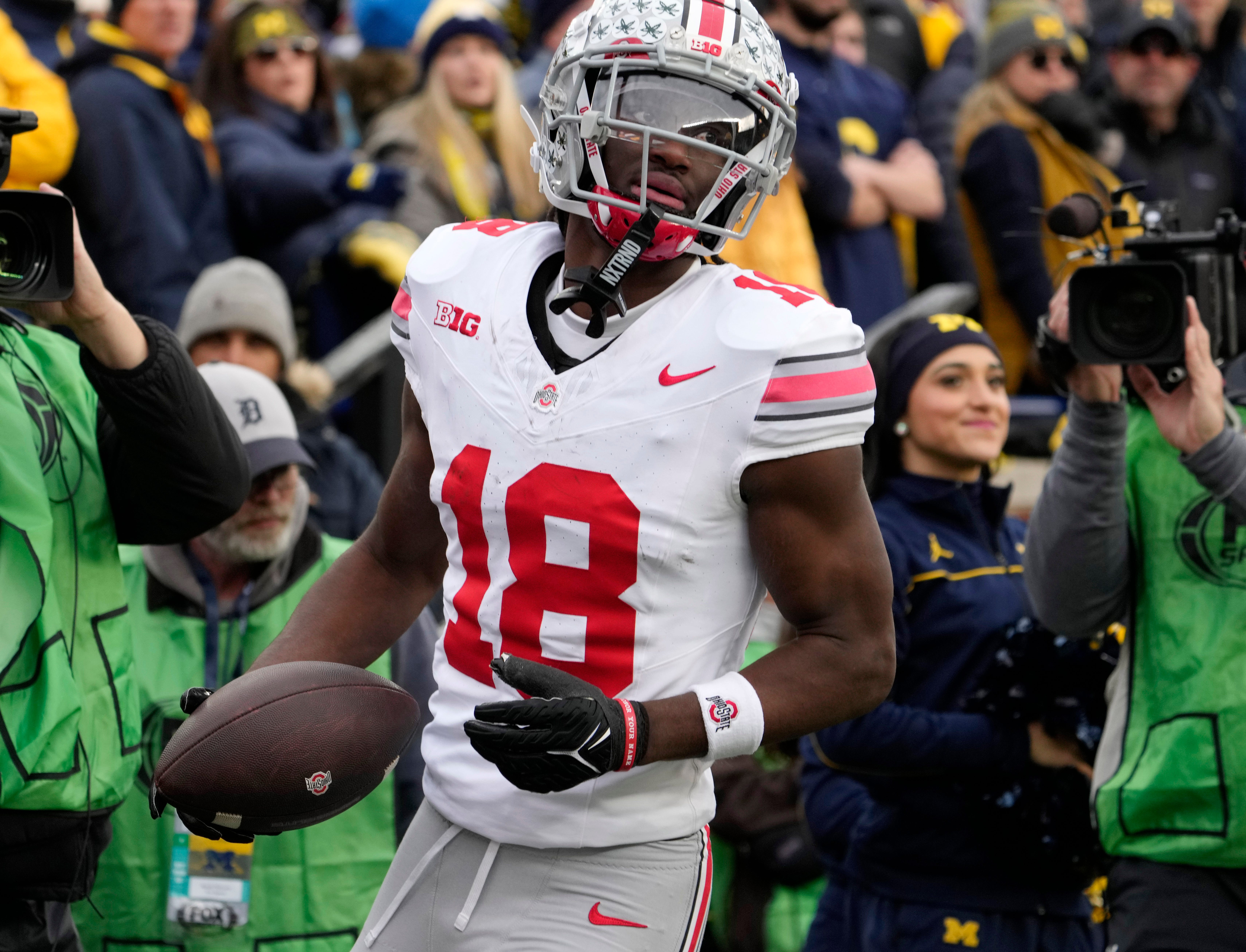 Nov. 25, 2023; Ann Arbor, Mi., USA; Ohio State Buckeyes wide receiver Marvin Harrison Jr. (18) scores a touchdown during the second half of Saturday's NCAA Division I football game against the University of Michigan.