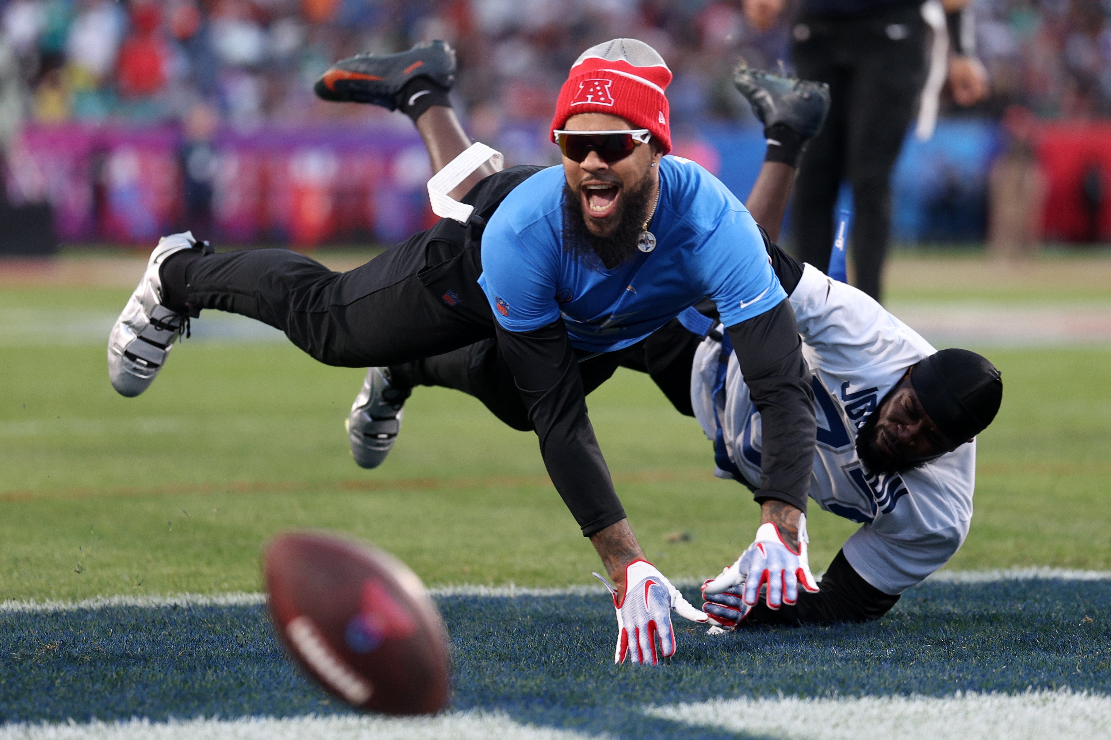 Feb 4, 2024; Orlando, FL, USA; AFC wide receiver Keenan Allen (13) of the Los Angeles Chargers attempts to make a catch during the 2024 Pro Bowl at Camping World Stadium.