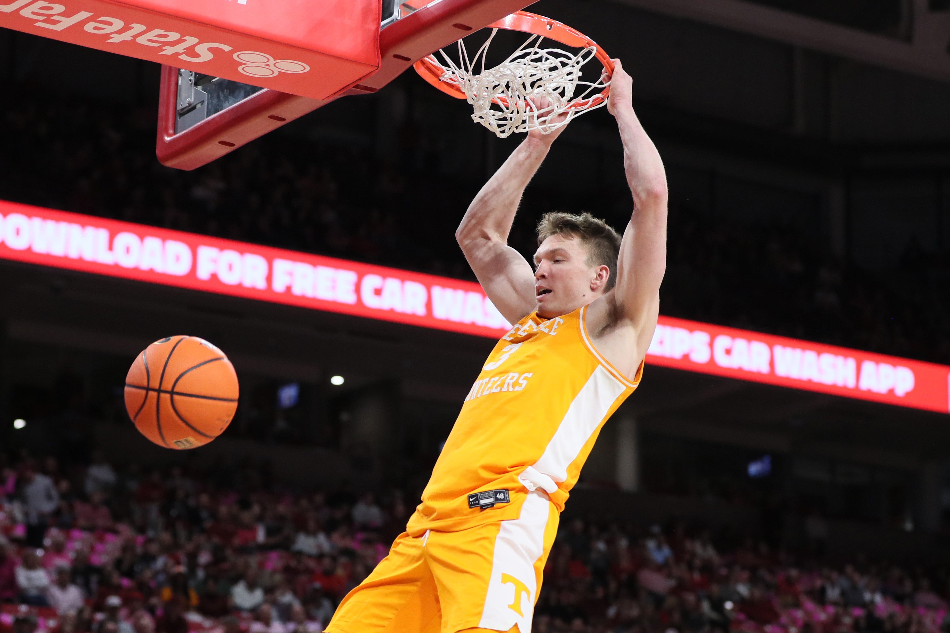 Feb 14, 2024; Fayetteville, Arkansas, USA; Tennessee Volunteers guard Dalton Knecht (3) dunks the ball in the first half against the Arkansas Razorbacks at Bud Walton Arena.