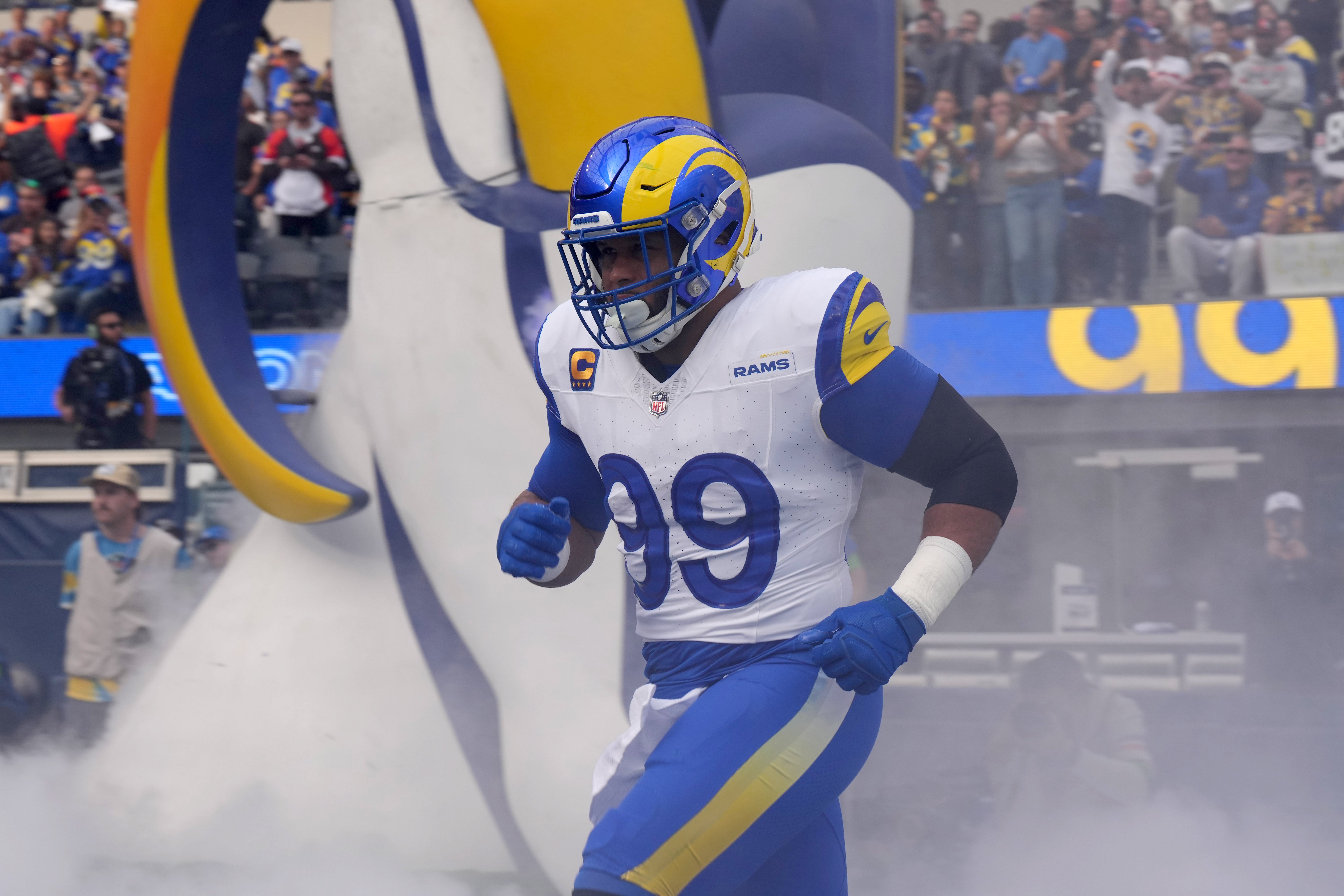 Dec 3, 2023; Inglewood, California, USA; Los Angeles Rams defensive tackle Aaron Donald (99) enters the field before the game against the Cleveland Browns at SoFi Stadium.