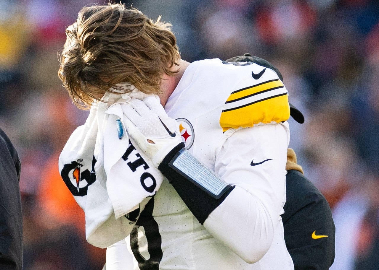 Nov 19, 2023; Cleveland, Ohio, USA; Pittsburgh Steelers quarterback Kenny Pickett (8) holds his head as he walks off the field following an injury during the third quarter against the Cleveland Browns at Cleveland Browns Stadium. Mandatory Credit: Scott Galvin-USA TODAY Sports