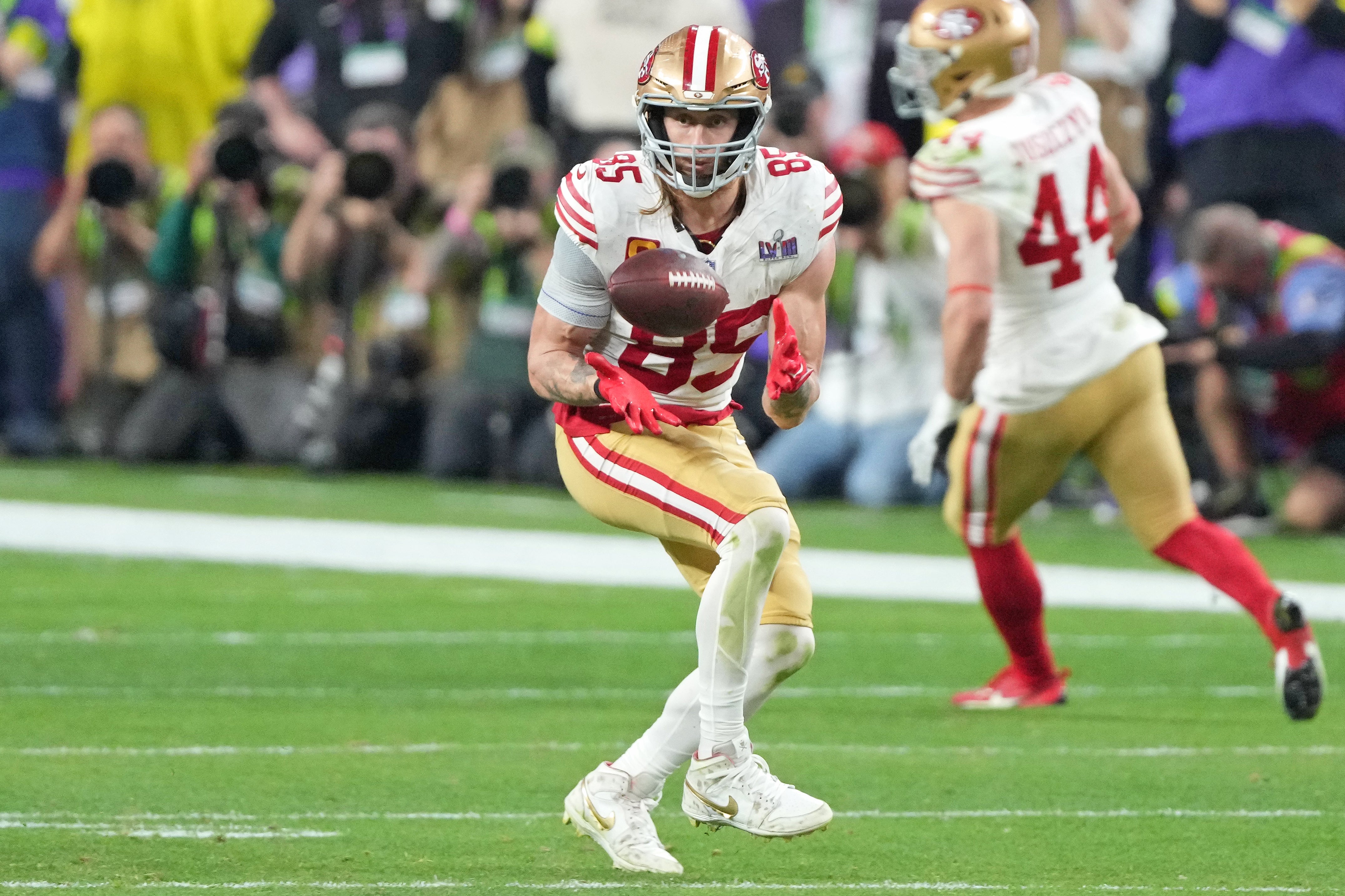 Feb 11, 2024; Paradise, Nevada, USA; San Francisco 49ers tight end George Kittle (85) makes a catch against the Kansas City Chiefs during the fourth quarter of Super Bowl LVIII at Allegiant Stadium.