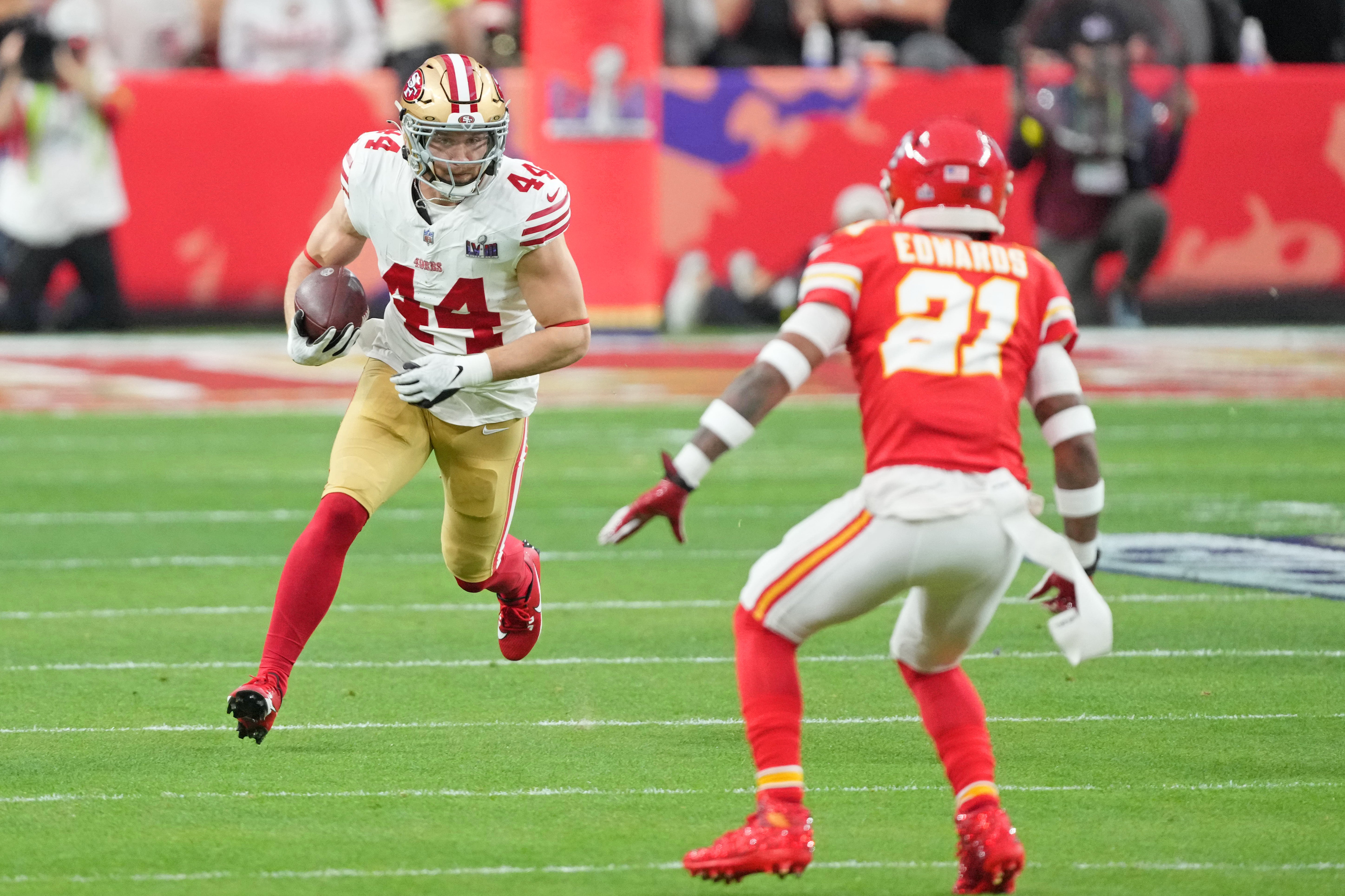 Feb 11, 2024; Paradise, Nevada, USA; San Francisco 49ers fullback Kyle Juszczyk (44) runs with the ball against the Kansas City Chiefs during the first quarter Super Bowl LVIII at Allegiant Stadium.