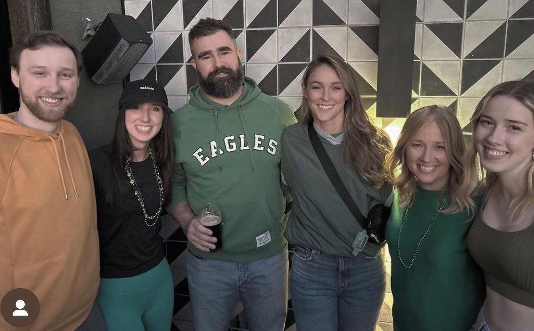 Jason and Kylie Kelce pose for a picture with the McHugh School of Irish Dance.