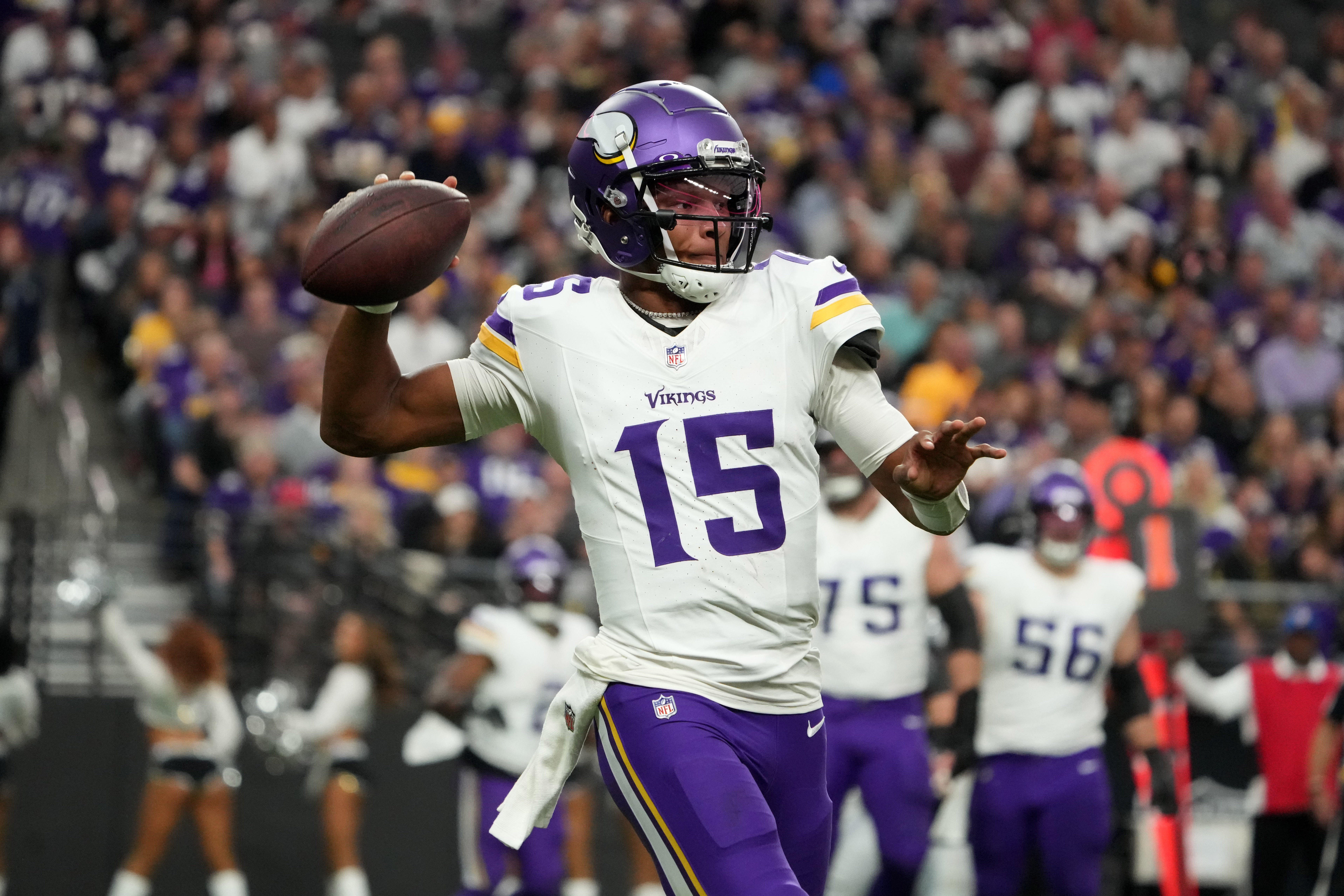 Dec 10, 2023; Paradise, Nevada, USA; Minnesota Vikings quarterback Joshua Dobbs (15) throws the ball against the Las Vegas Raiders in the first half at Allegiant Stadium.