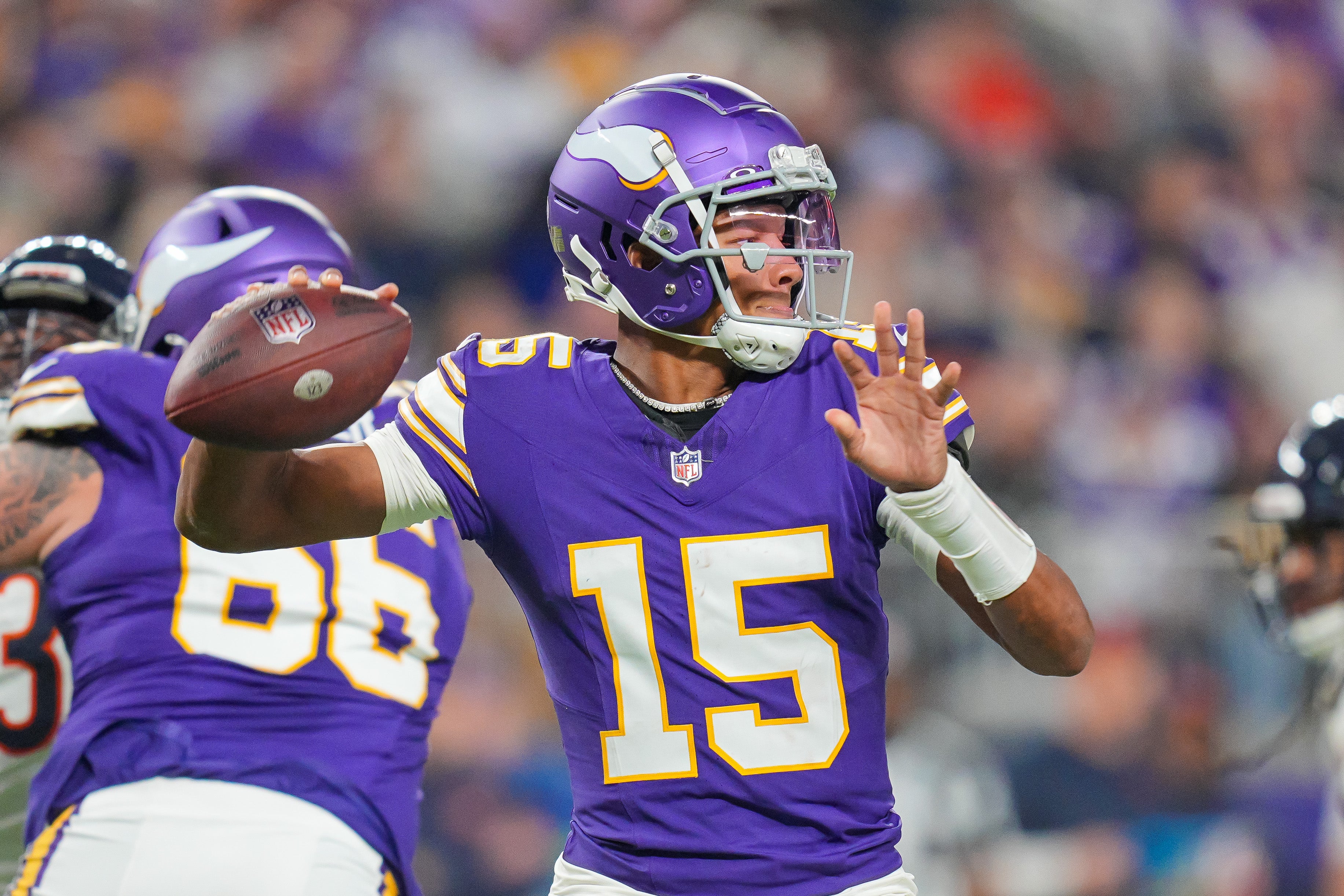 Nov 27, 2023; Minneapolis, Minnesota, USA; Minnesota Vikings quarterback Joshua Dobbs (15) passes against the Chicago Bears in the fourth quarter at U.S. Bank Stadium.