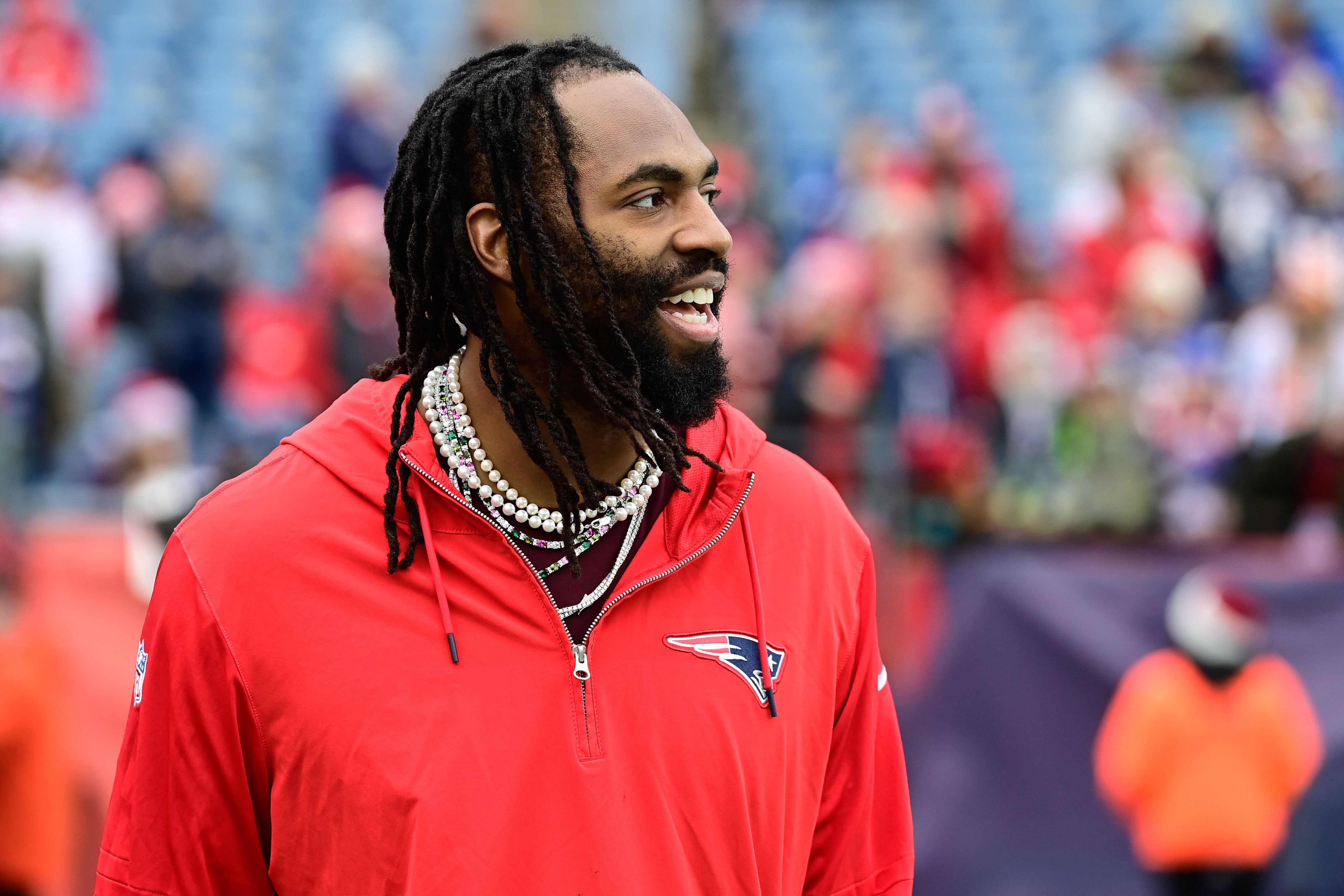 Dec 17, 2023; Foxborough, Massachusetts, USA; New England Patriots linebacker Matthew Judon (9) greets fans before a game against the Kansas City Chiefs at Gillette Stadium.