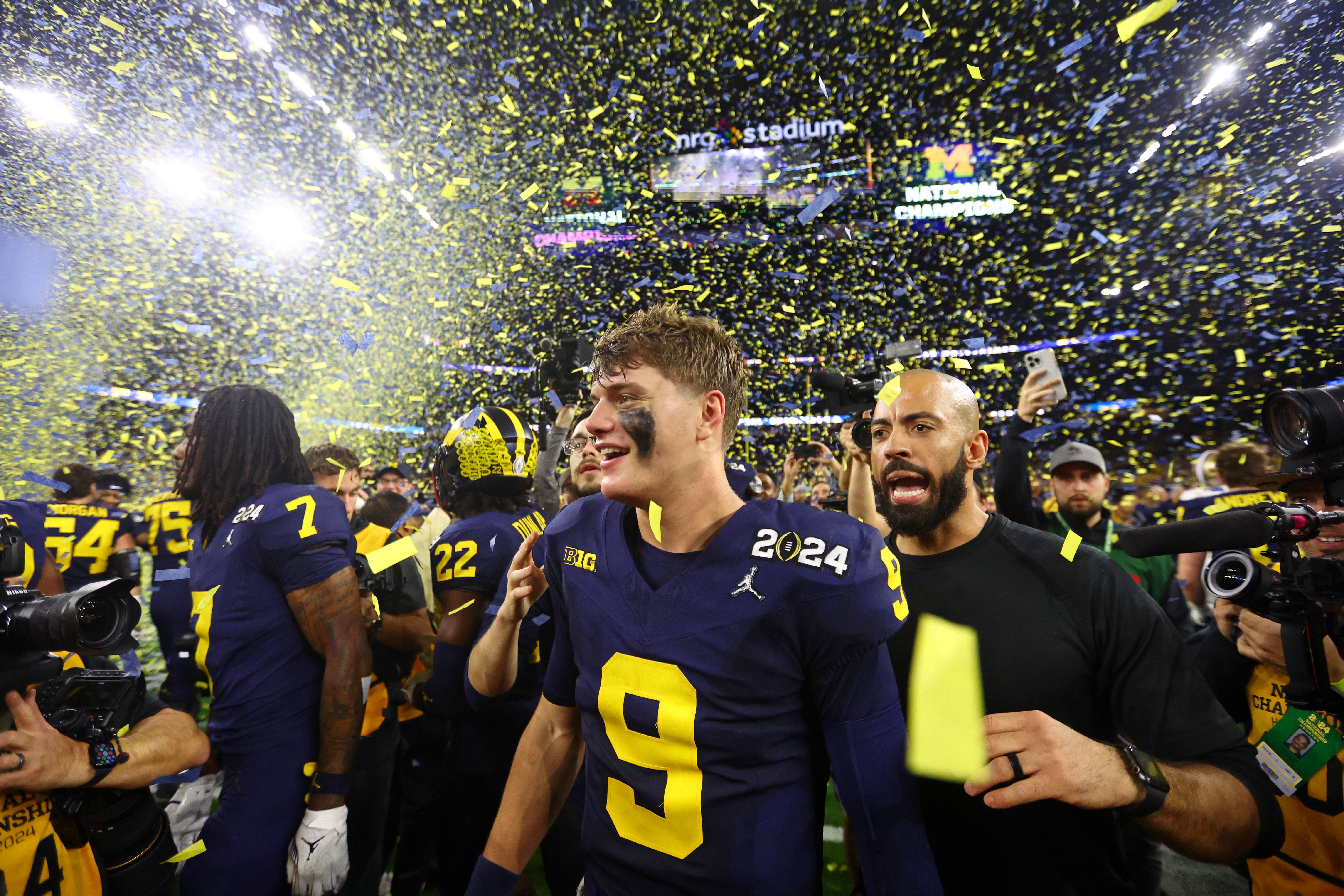 Jan 8, 2024; Houston, TX, USA; Michigan Wolverines quarterback J.J. McCarthy (9) celebrates after winning the 2024 College Football Playoff national championship game against the Washington Huskies at NRG Stadium.