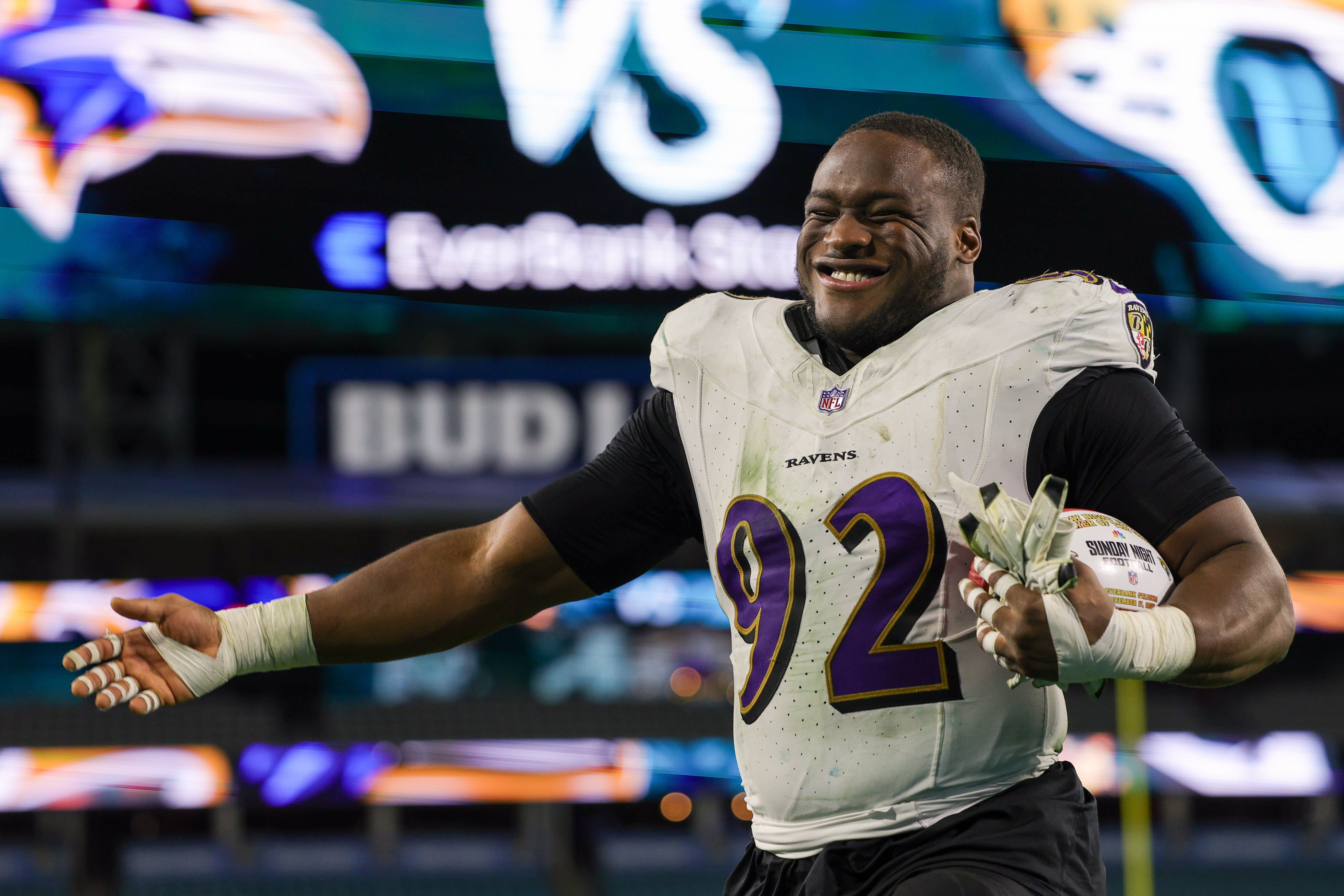 Dec 17, 2023; Jacksonville, Florida, USA; Baltimore Ravens defensive tackle Justin Madubuike (92) celebrates after beating the Jacksonville Jaguars at EverBank Stadium.