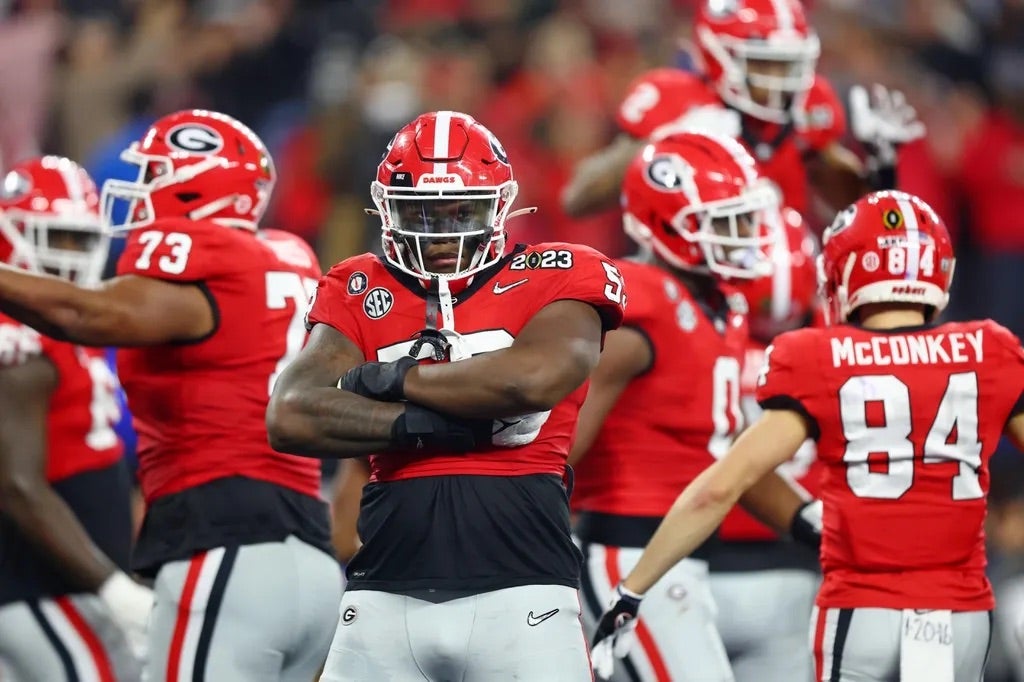 Georgia Bulldogs offensive lineman Jared Wilson (55) reacts after a play against the TCU Horned Frogs during the second quarter of the CFP national championship game at SoFi Stadium.