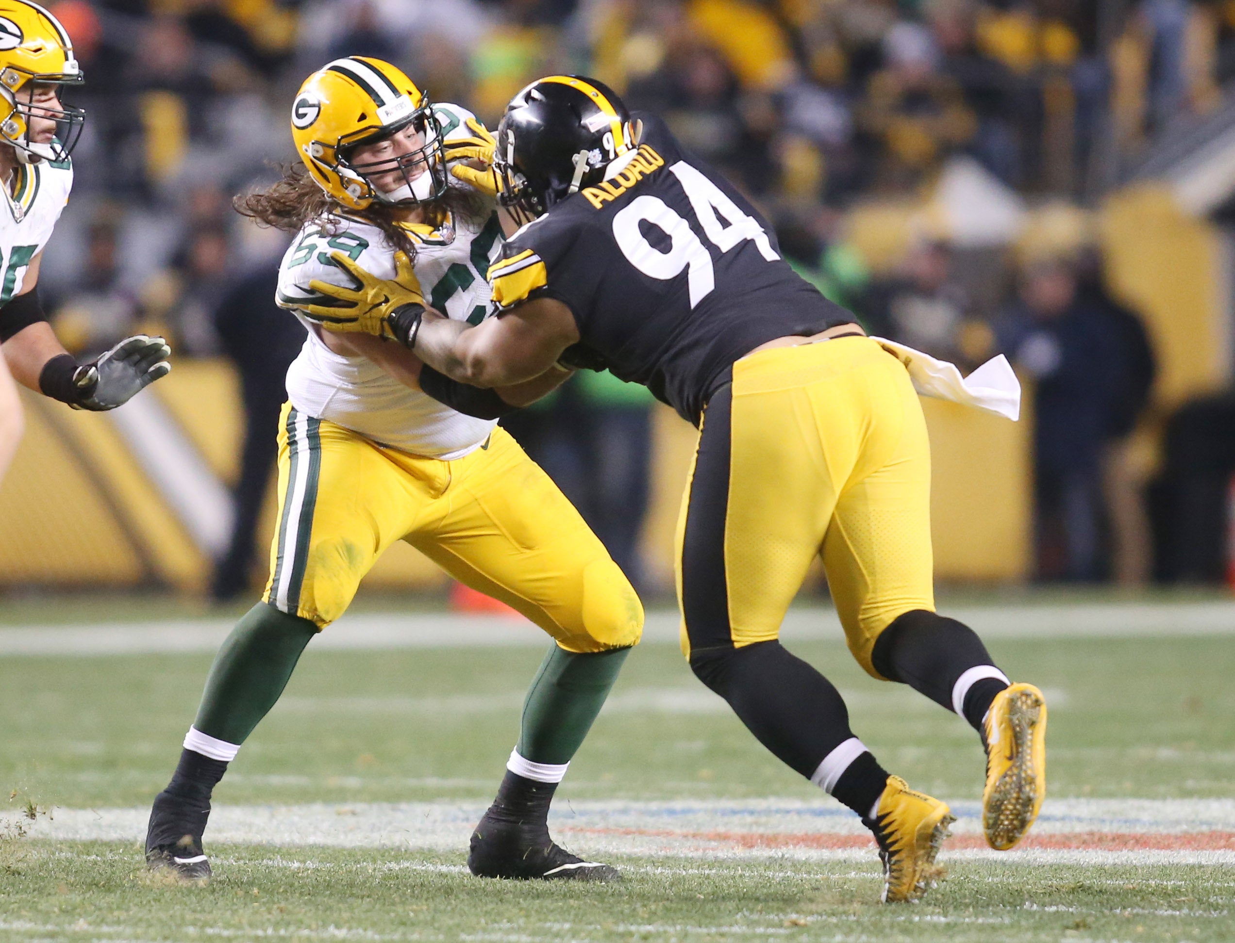 Nov 26, 2017; Pittsburgh, PA, USA; Green Bay Packers offensive tackle David Bakhtiari (69) blocks at the line of scrimmage against Pittsburgh Steelers defensive end Tyson Alualu (94) during the fourth quarter at Heinz Field. The Steelers won 31-28. Mandatory Credit:Charles LeClaire-USA TODAY Sports