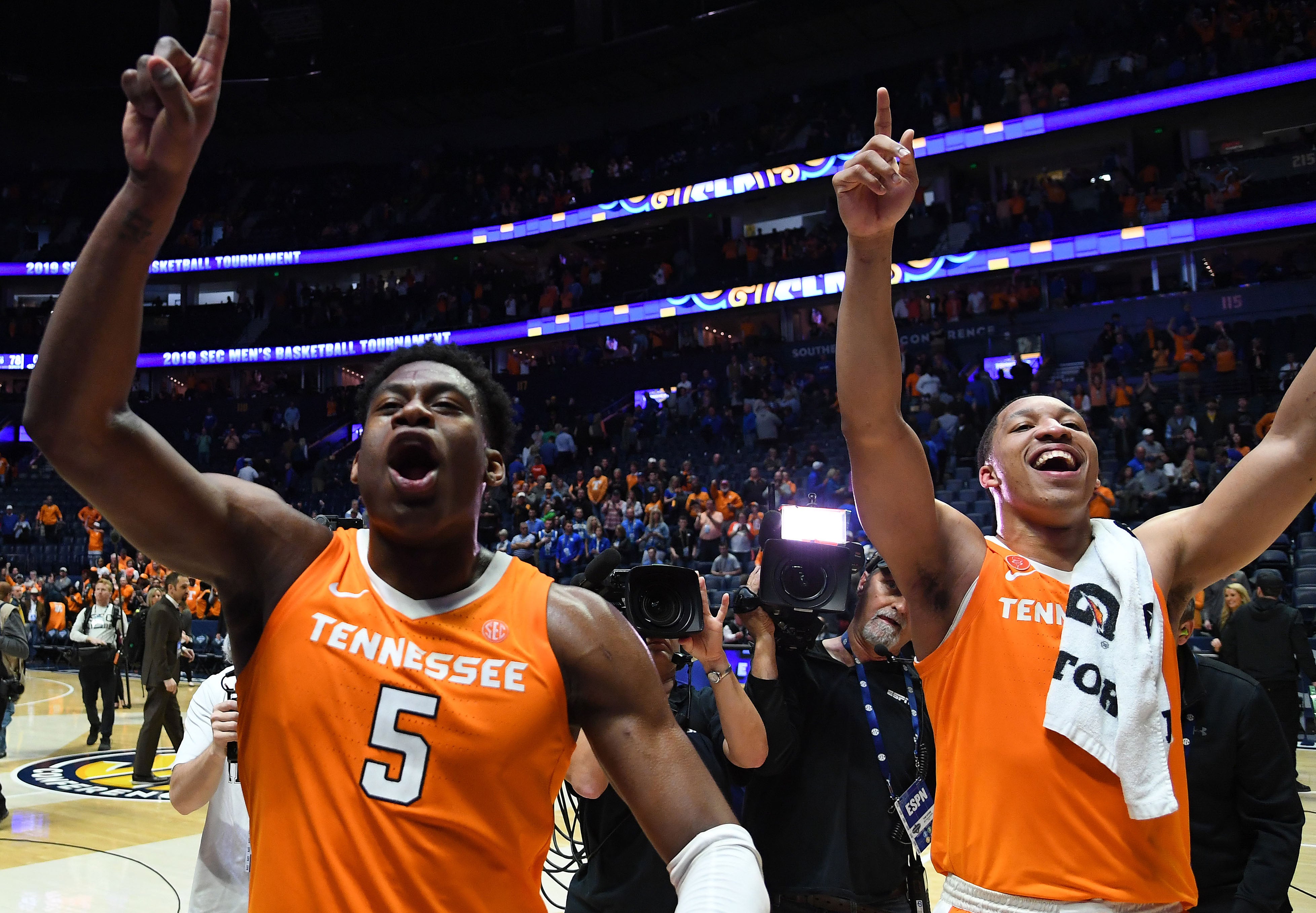 Mar 16, 2019; Nashville, TN, USA; Tennessee Volunteers forward Grant Williams (2) and Volunteers guard Admiral Schofield (5) celebrate after defeating the Kentucky Wildcats in the SEC conference tournament at Bridgestone Arena.