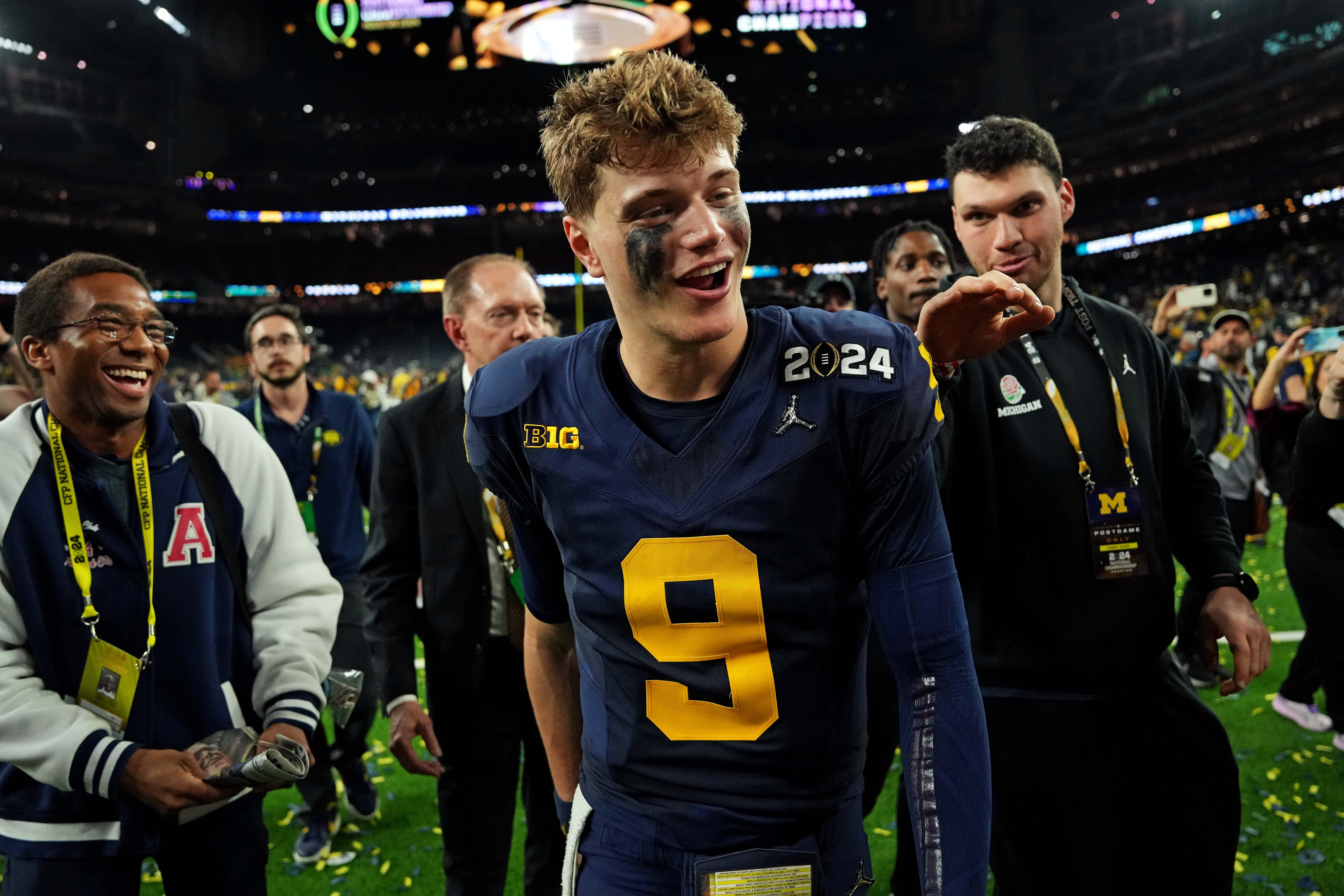 Jan 8, 2024; Houston, TX, USA; Michigan Wolverines quarterback J.J. McCarthy (9) celebrates after beating the Washington Huskies in the 2024 College Football Playoff national championship game at NRG Stadium.