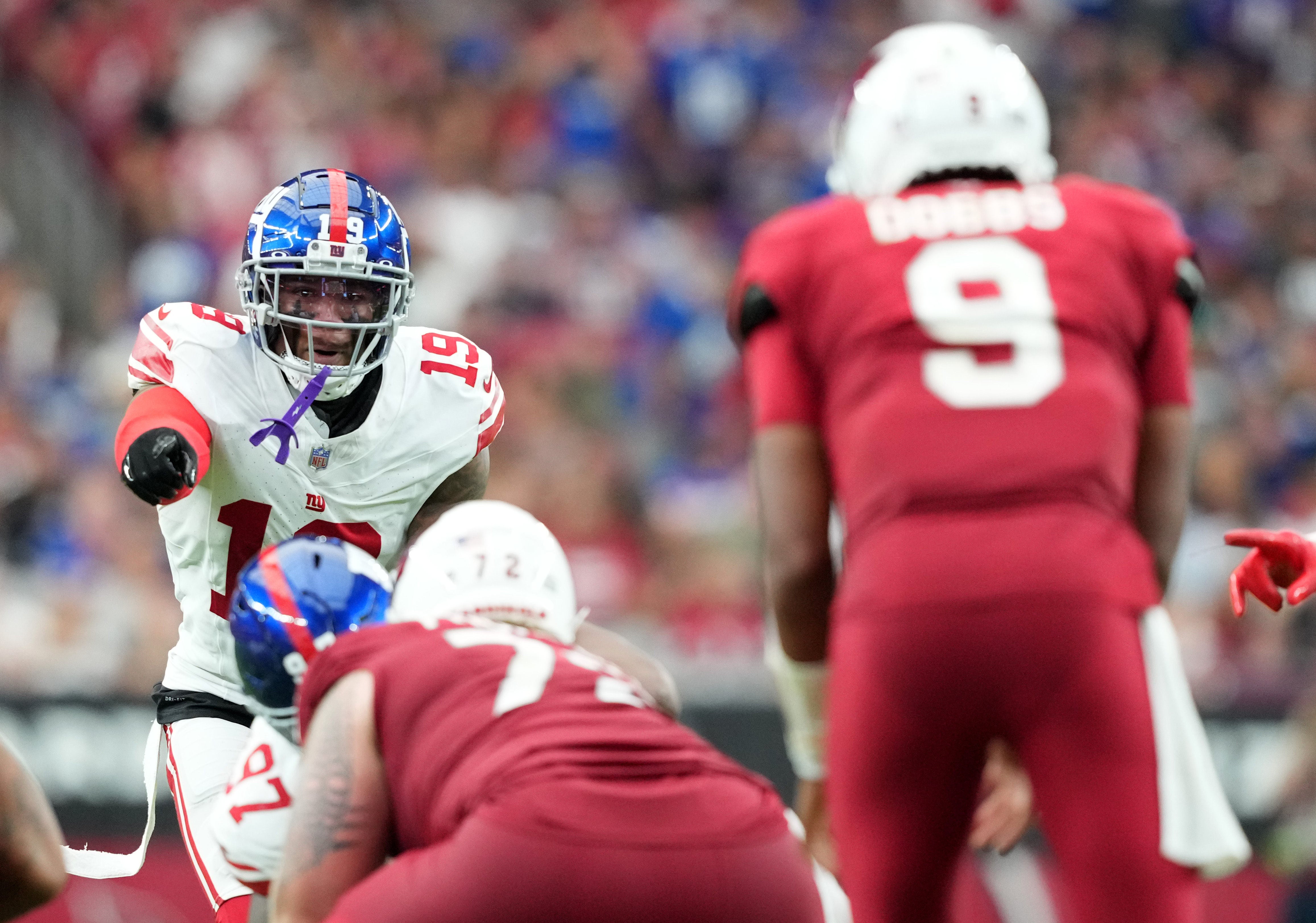 Sep 17, 2023; Glendale, Arizona, USA; New York Giants safety Isaiah Simmons (19) calls signals against the Arizona Cardinals during the second half at State Farm Stadium.