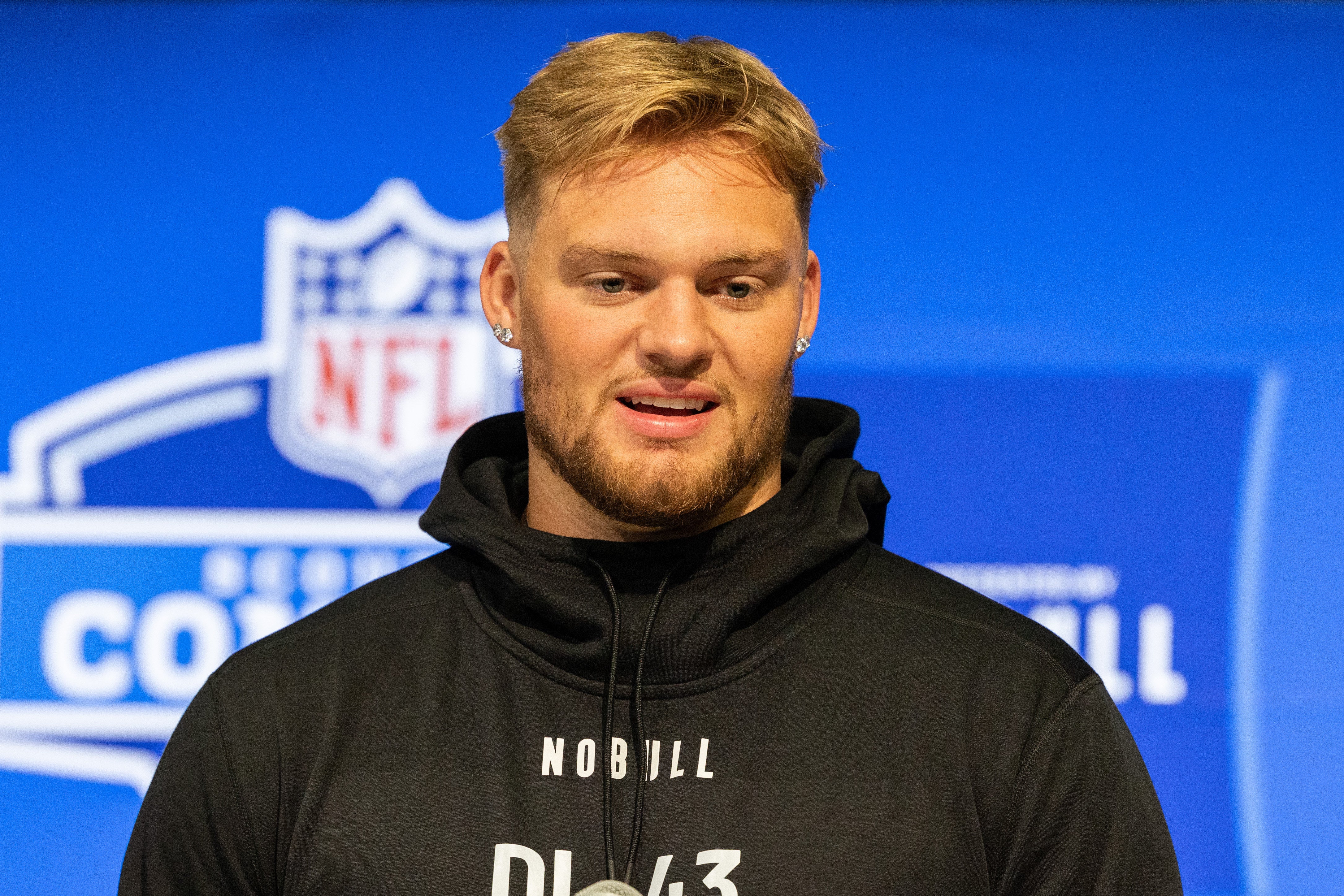 Feb 28, 2024; Indianapolis, IN, USA; Michigan defensive lineman Braiden McGregor (DL43) talks to the media at the 2024 NFL Combine at Indiana Convention Center.