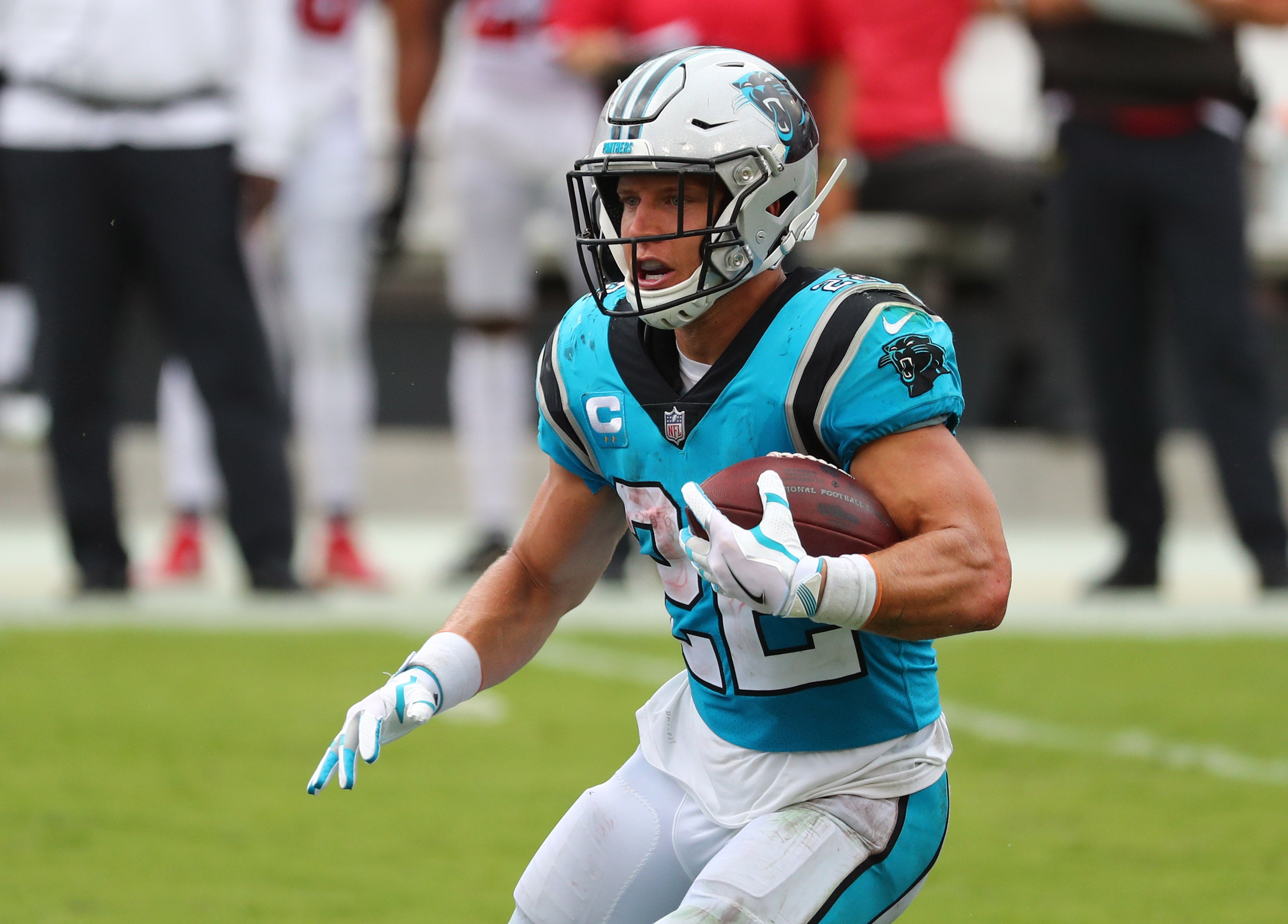 Sep 20, 2020; Tampa, Florida, USA; Carolina Panthers running back Christian McCaffrey runs the ball against the Tampa Bay Buccaneers during the third quarter at Raymond James Stadium.