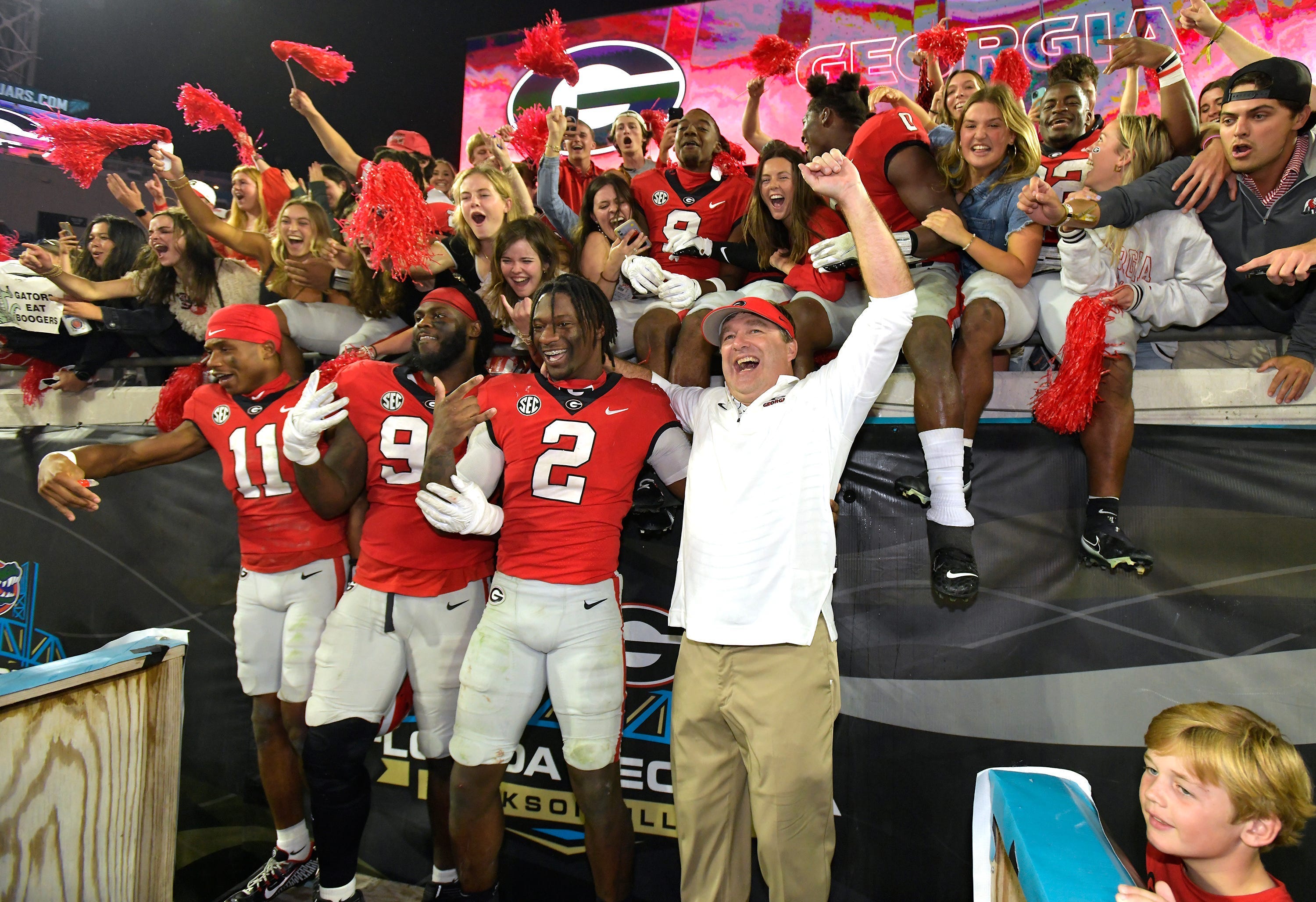 Georgia Bulldogs head coach Kirby Smart celebrates with his players and fans after their victory over Florida. The annual Georgia vs Florida football rivalry was held at TIAA Bank Field in Jacksonville, FL Saturday, October 29, 2022. The Bulldogs went in at halftime with a 28 to 3 lead over the Gators and won with a final score of 42 to 20. [Bob Self/Florida Times-Union] Jki 102822 Bs Georgia Vs Florida Football Game 2nd Half 06
