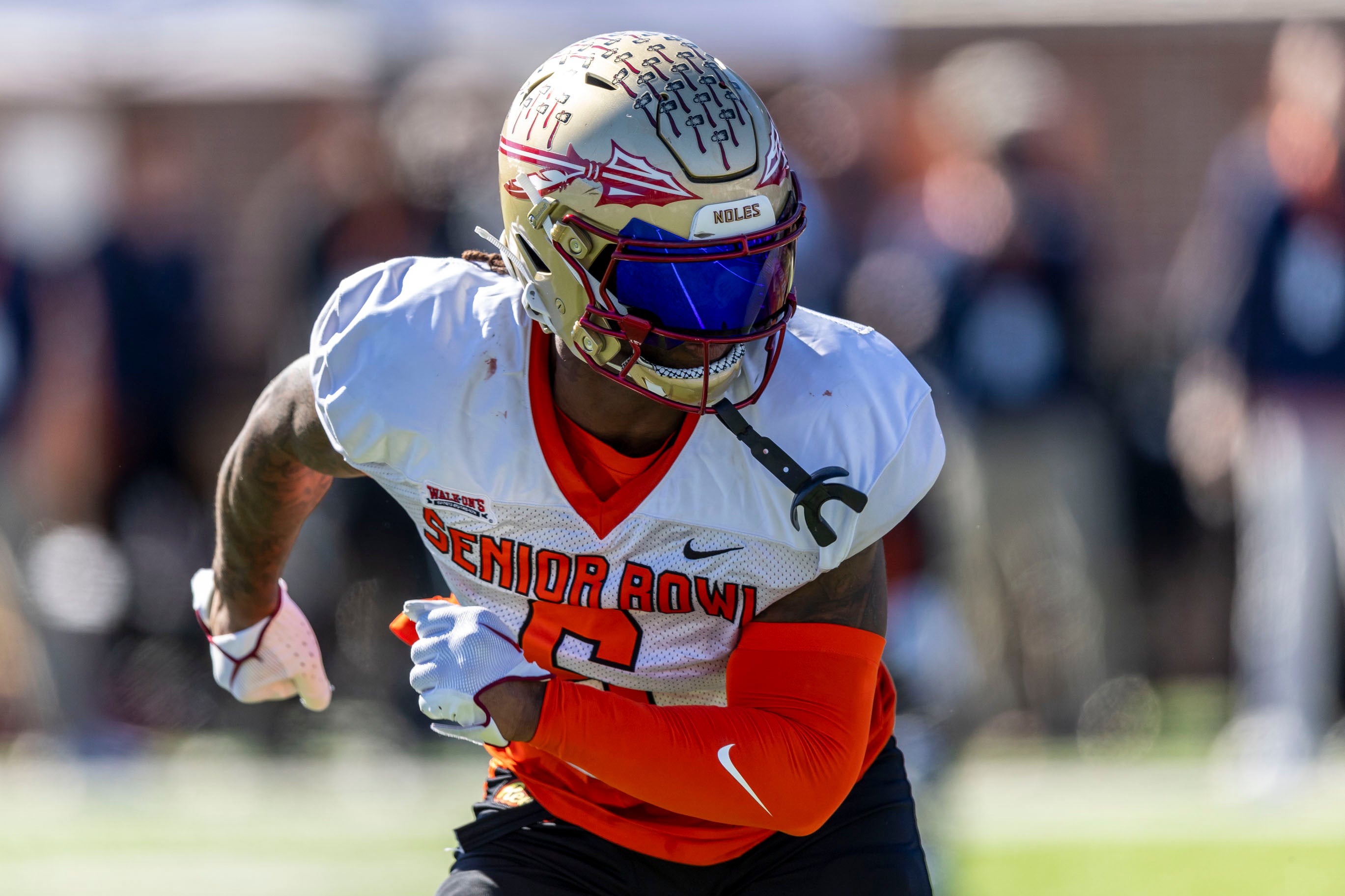 Jan 31, 2024; Mobile, AL, USA; American tight end Jaheim Bell of Florida State (6) runs a rout during practice for the American team at Hancock Whitney Stadium.